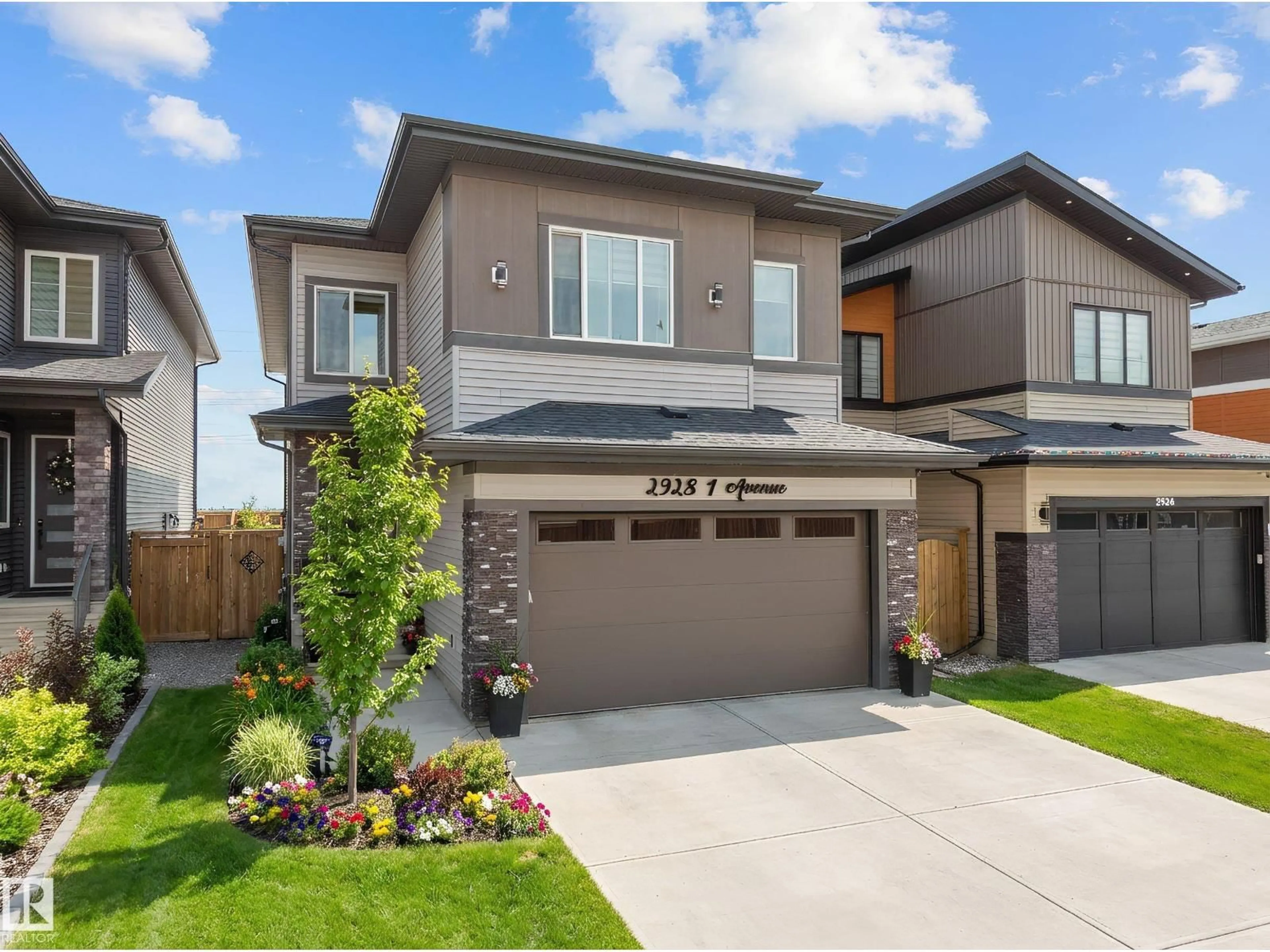 Home with brick exterior material, street for SW - 2928 1 AV, Edmonton Alberta T6X3E2