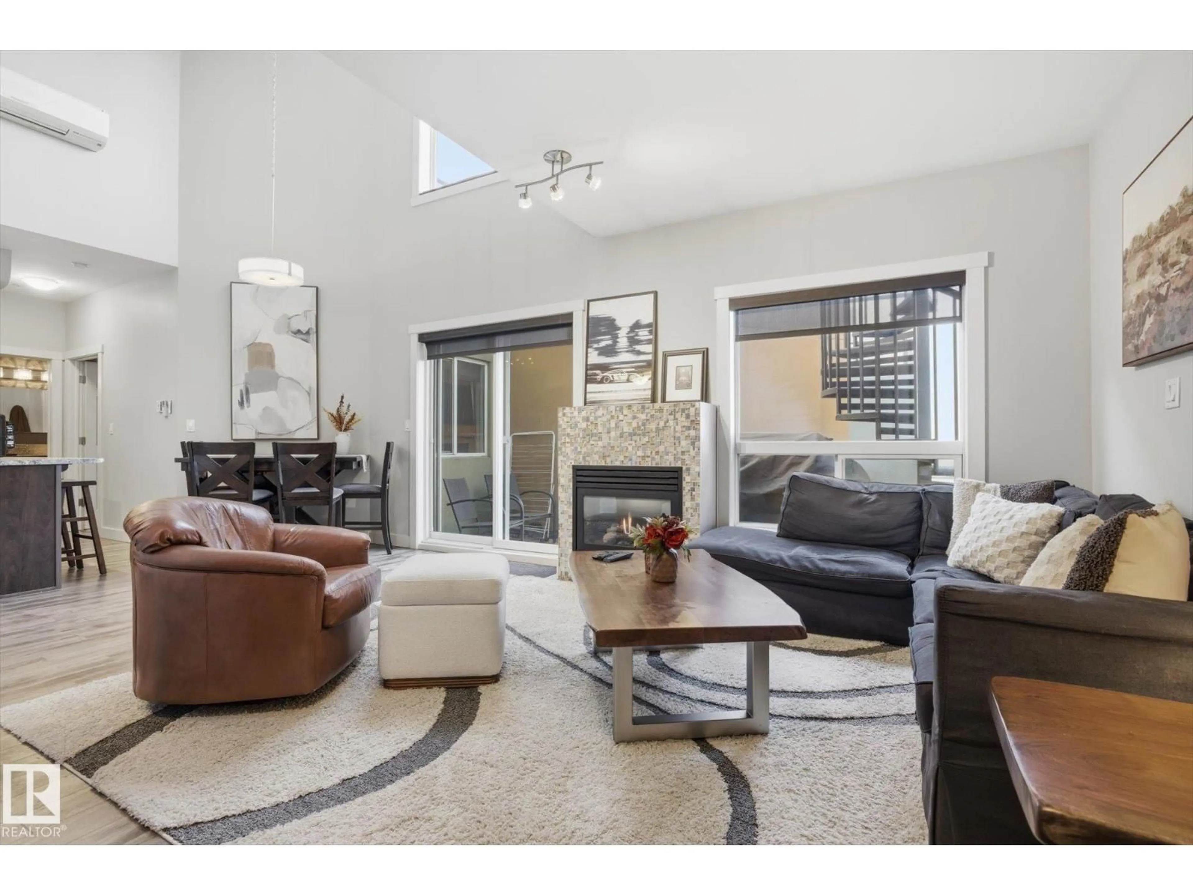 Living room with furniture, unknown for 10235 NW - 618 112 ST, Edmonton Alberta T5K1M7