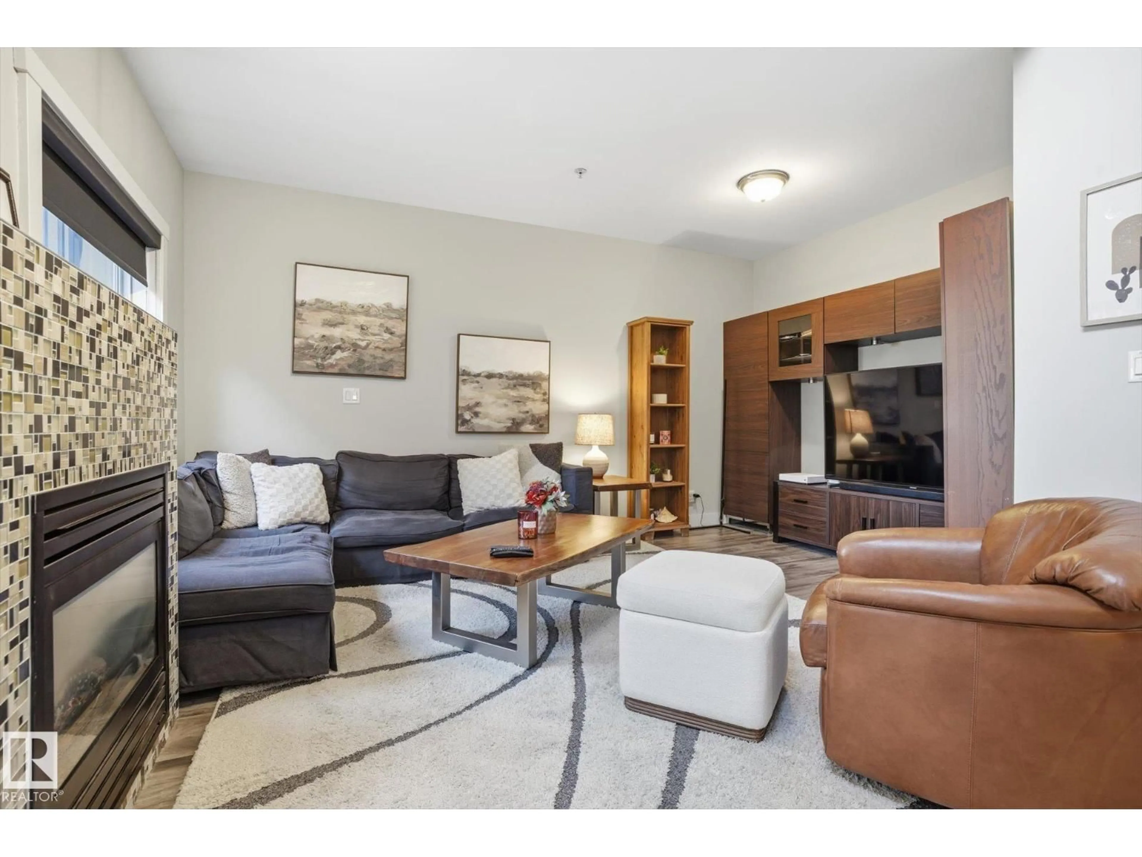 Living room with furniture, unknown for 10235 NW - 618 112 ST, Edmonton Alberta T5K1M7
