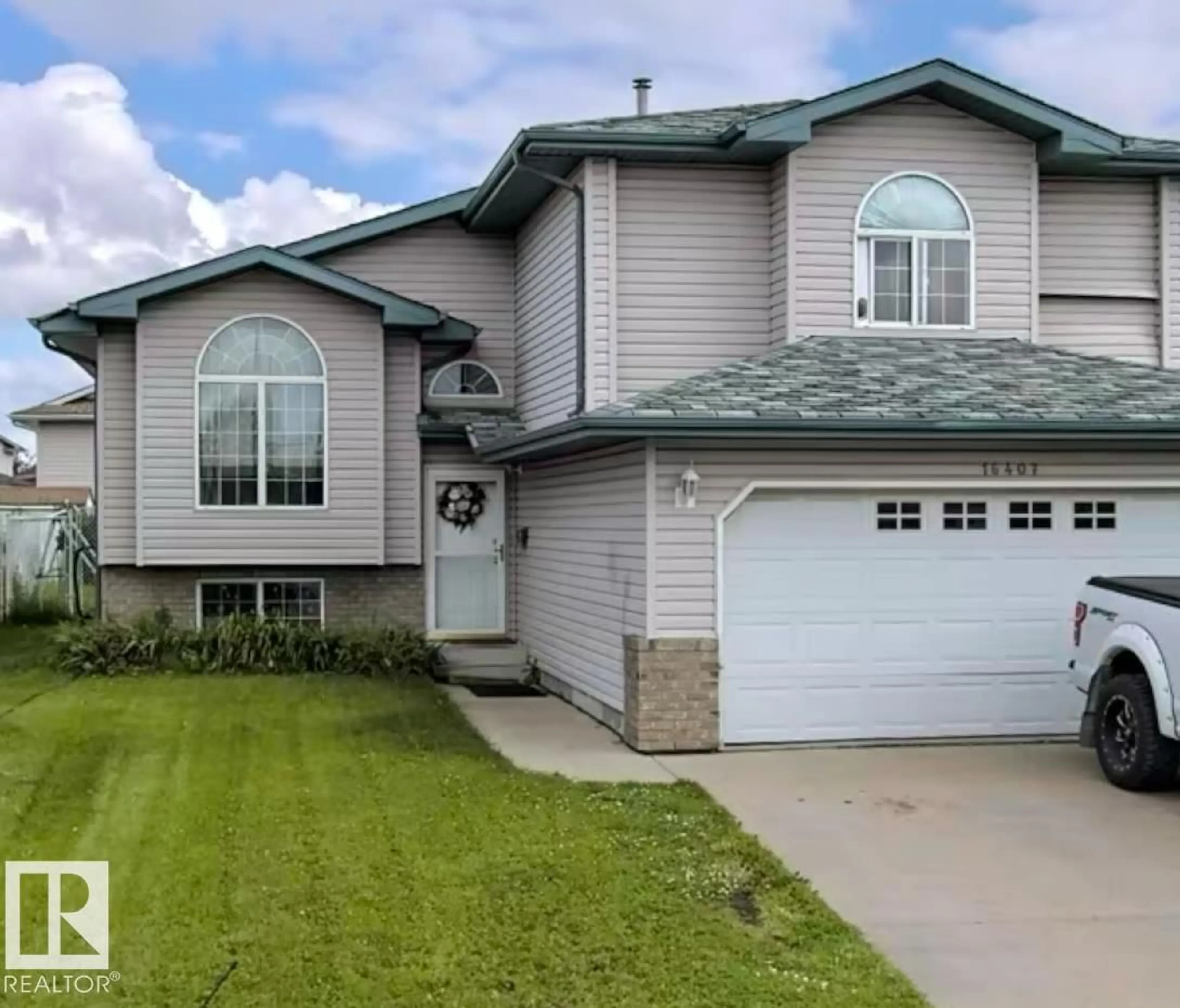 Home with vinyl exterior material, street for NW - 16407 81 ST, Edmonton Alberta T5Z3J3