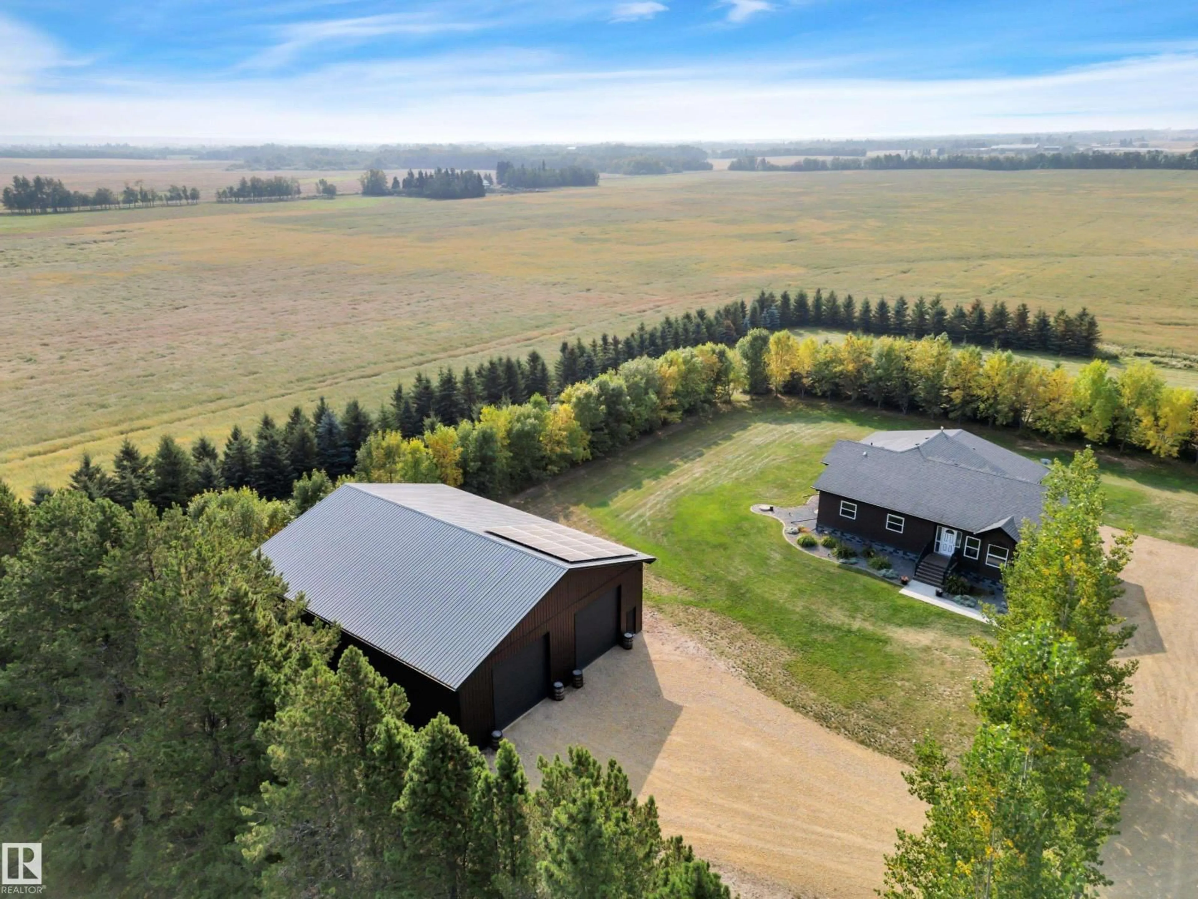 A pic from outside/outdoor area/front of a property/back of a property/a pic from drone, forest/trees view for 250023 TWP ROAD, Rural Wetaskiwin County Alberta T0C1Z0