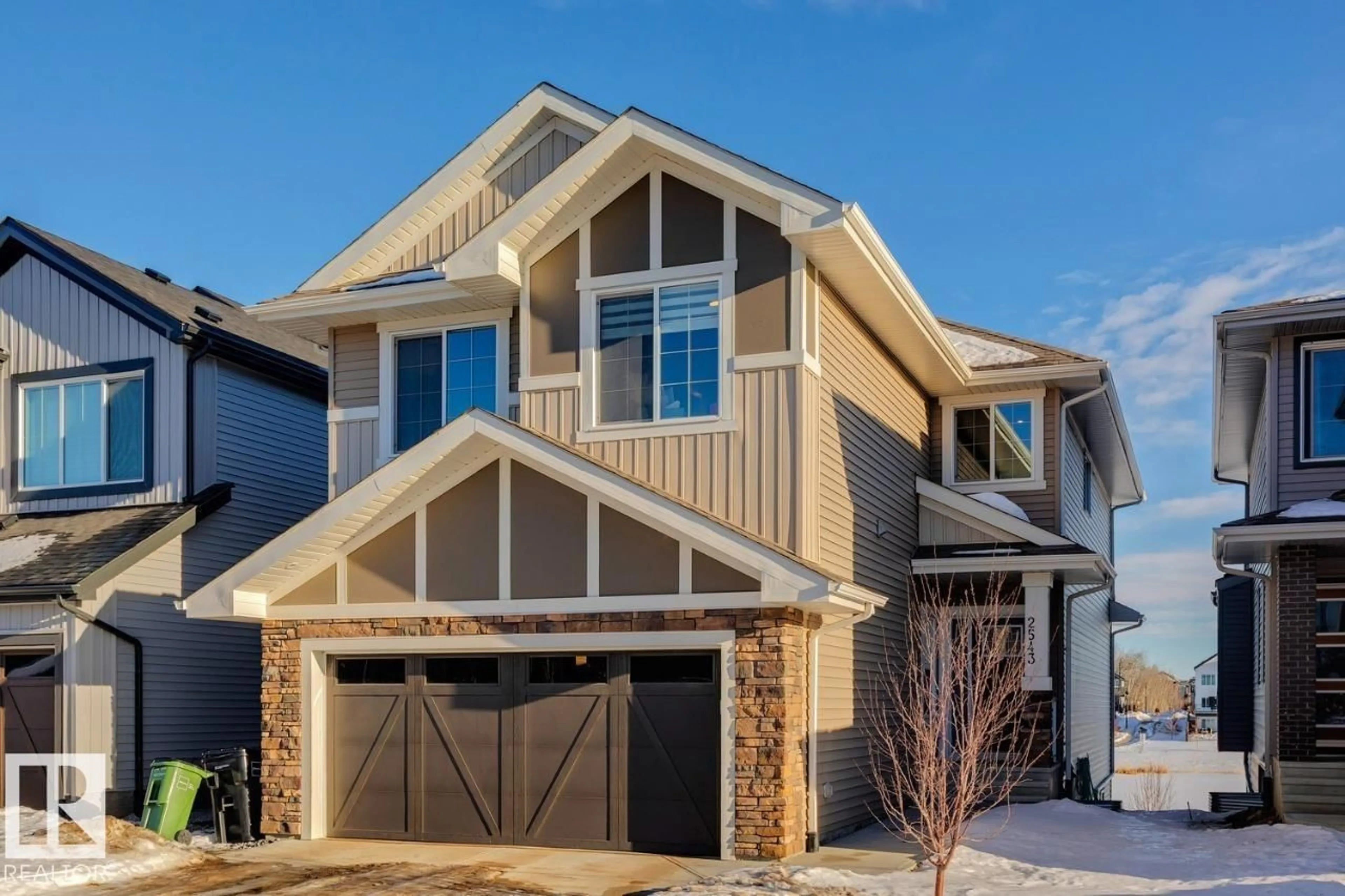 Home with vinyl exterior material, street for NW - 2543 208 ST, Edmonton Alberta T6M0N9