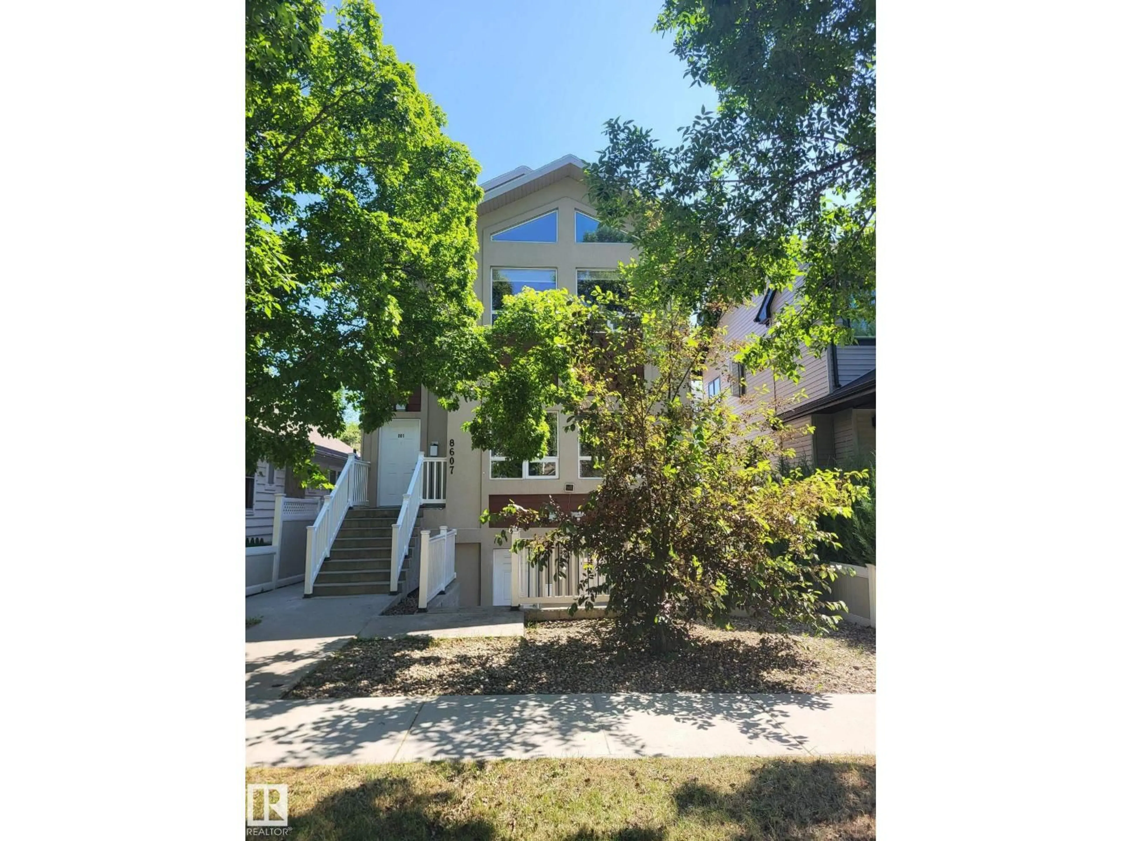 A pic from outside/outdoor area/front of a property/back of a property/a pic from drone, street for 8607 108A ST NW, Edmonton Alberta T6E4M9