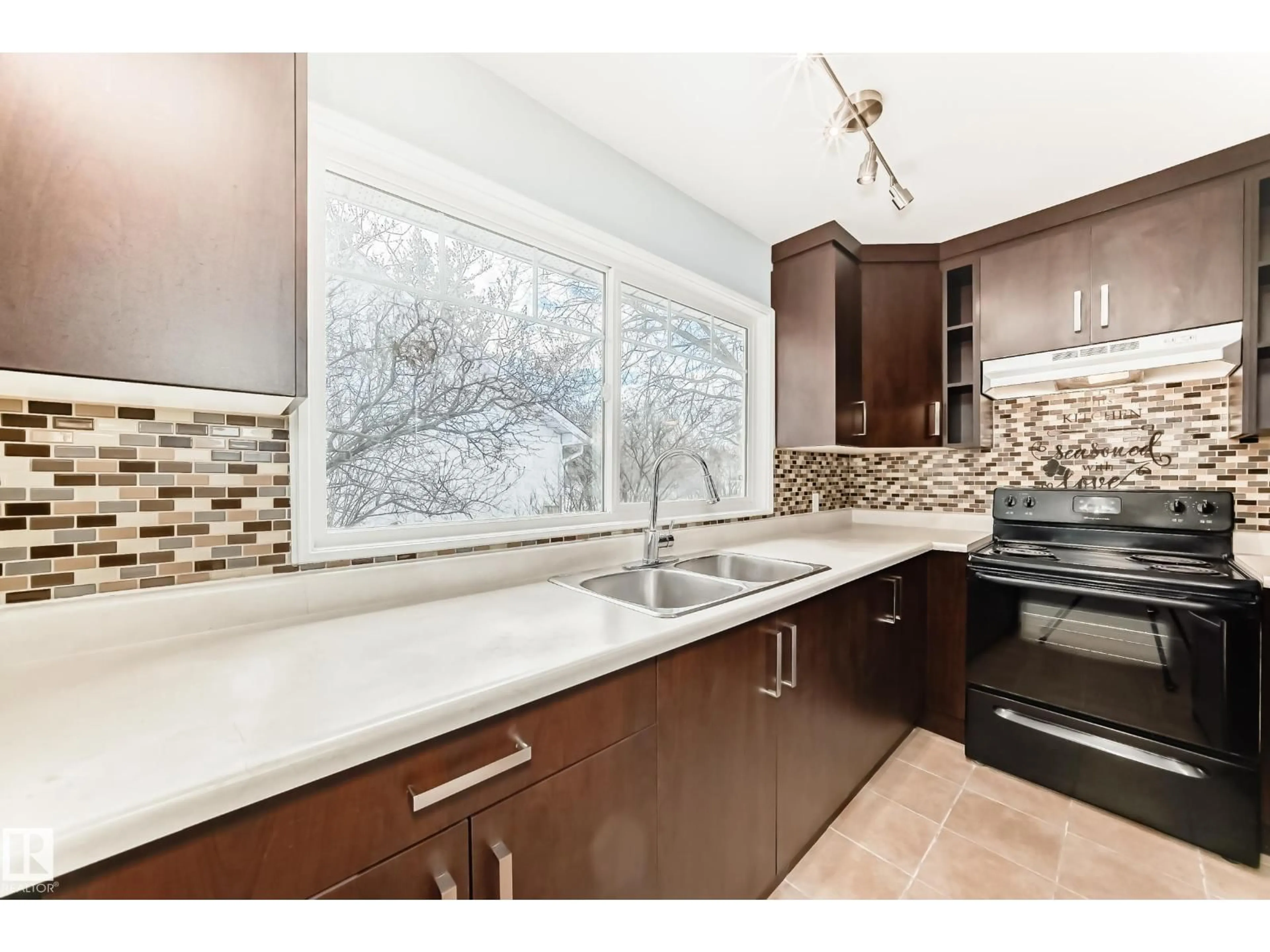 Open concept kitchen, ceramic/tile floor for NW - 10331 153 ST, Edmonton Alberta T5P2B7