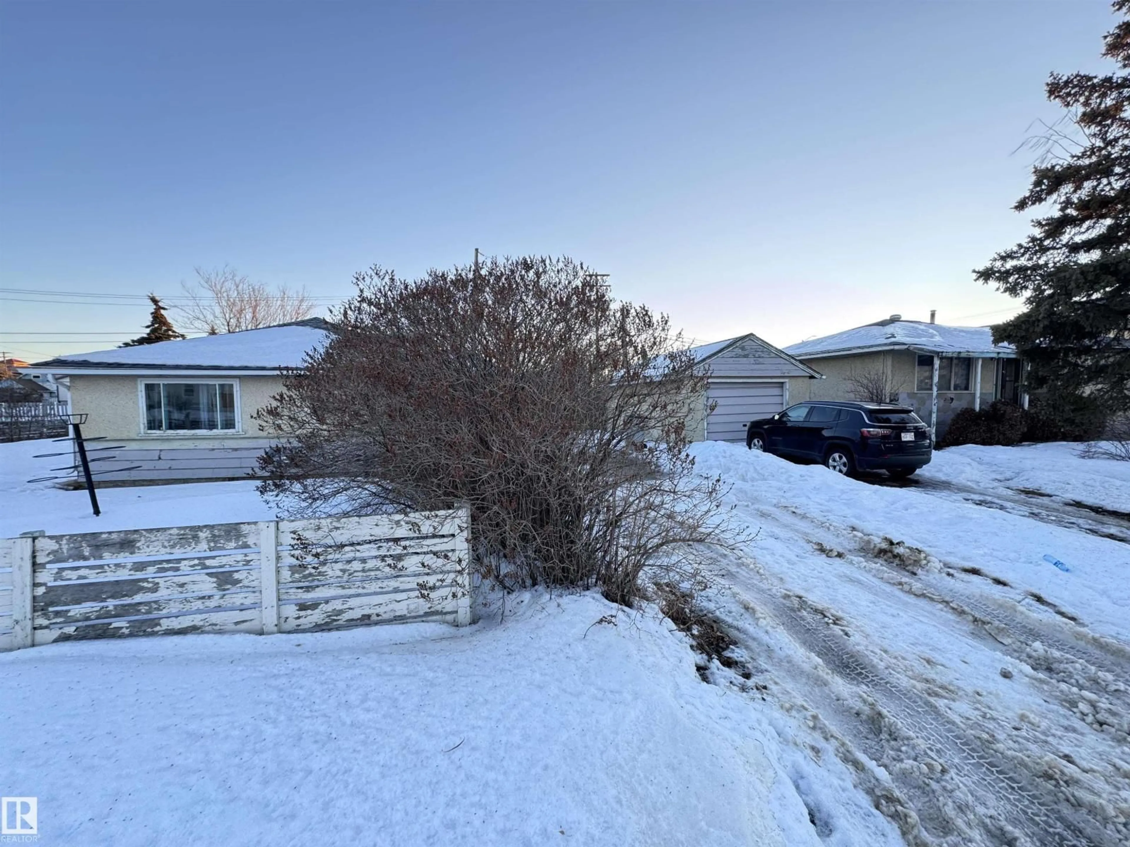 A pic from outside/outdoor area/front of a property/back of a property/a pic from drone, street for 10407 102 ST, Westlock Alberta T7P1K7