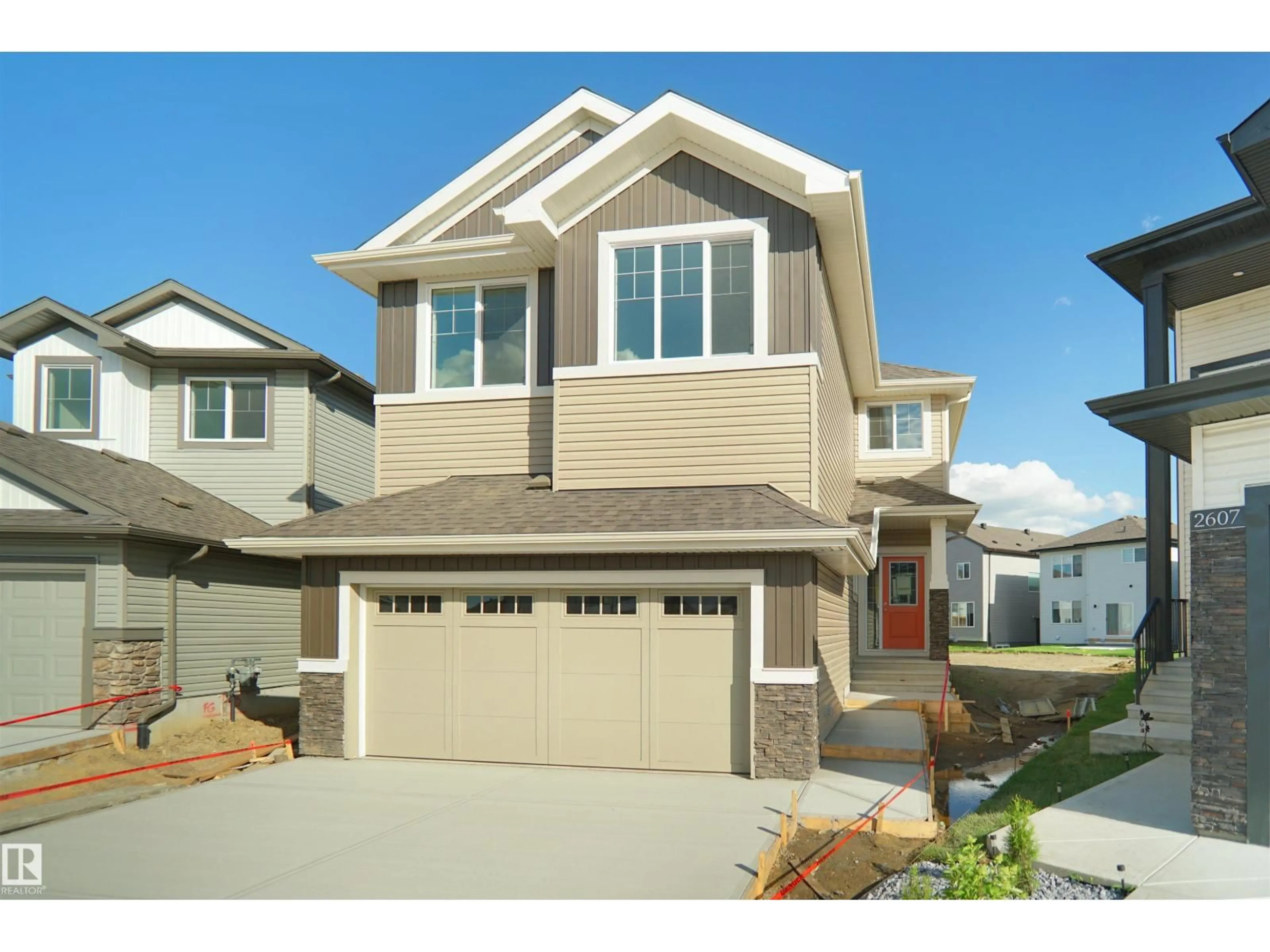 Home with vinyl exterior material, street for 2603 15 AV, Edmonton Alberta T6T2N5