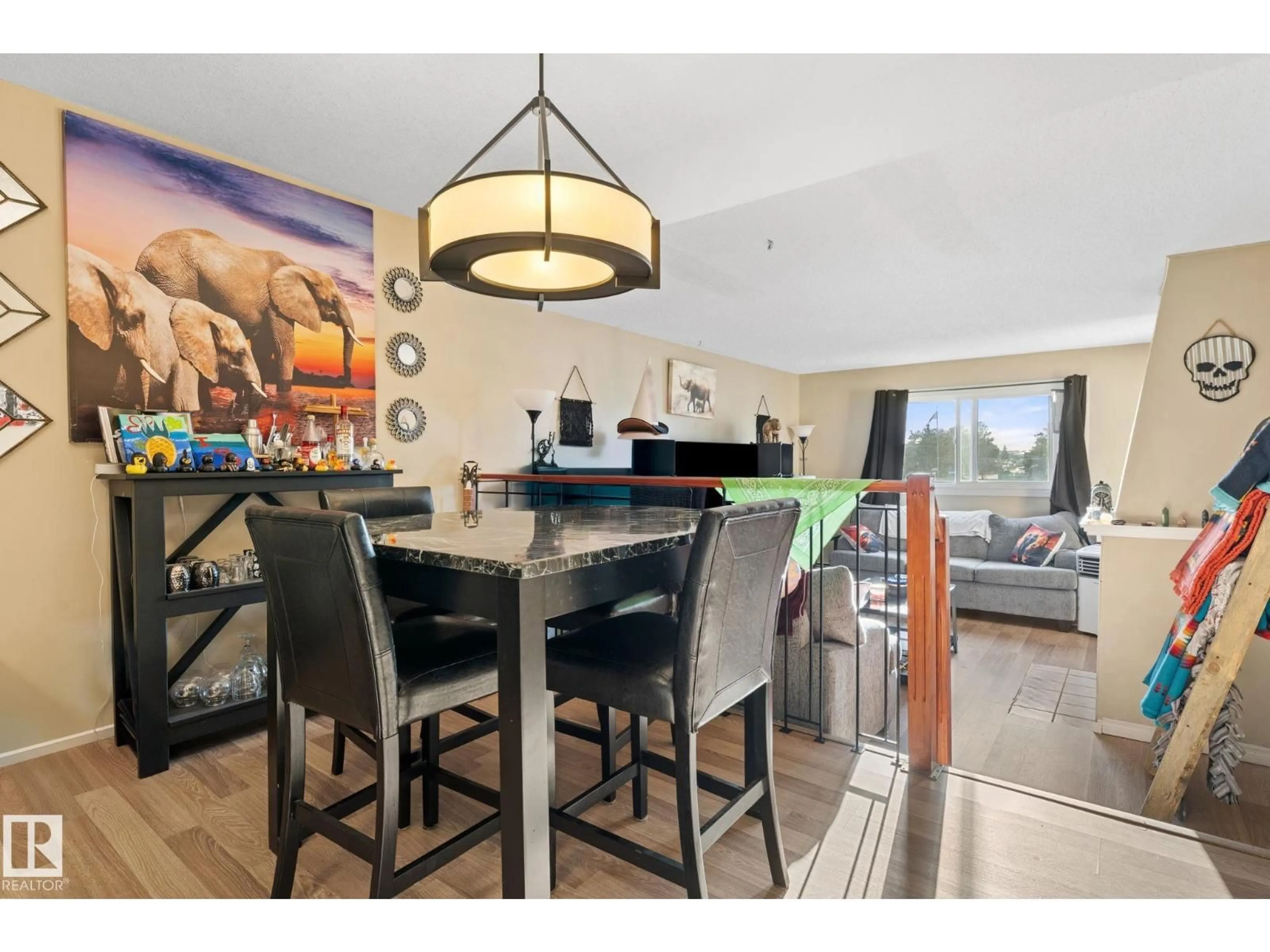 Dining room, wood/laminate floor for 202 - 2904 139 AV, Edmonton Alberta T5Y1P7