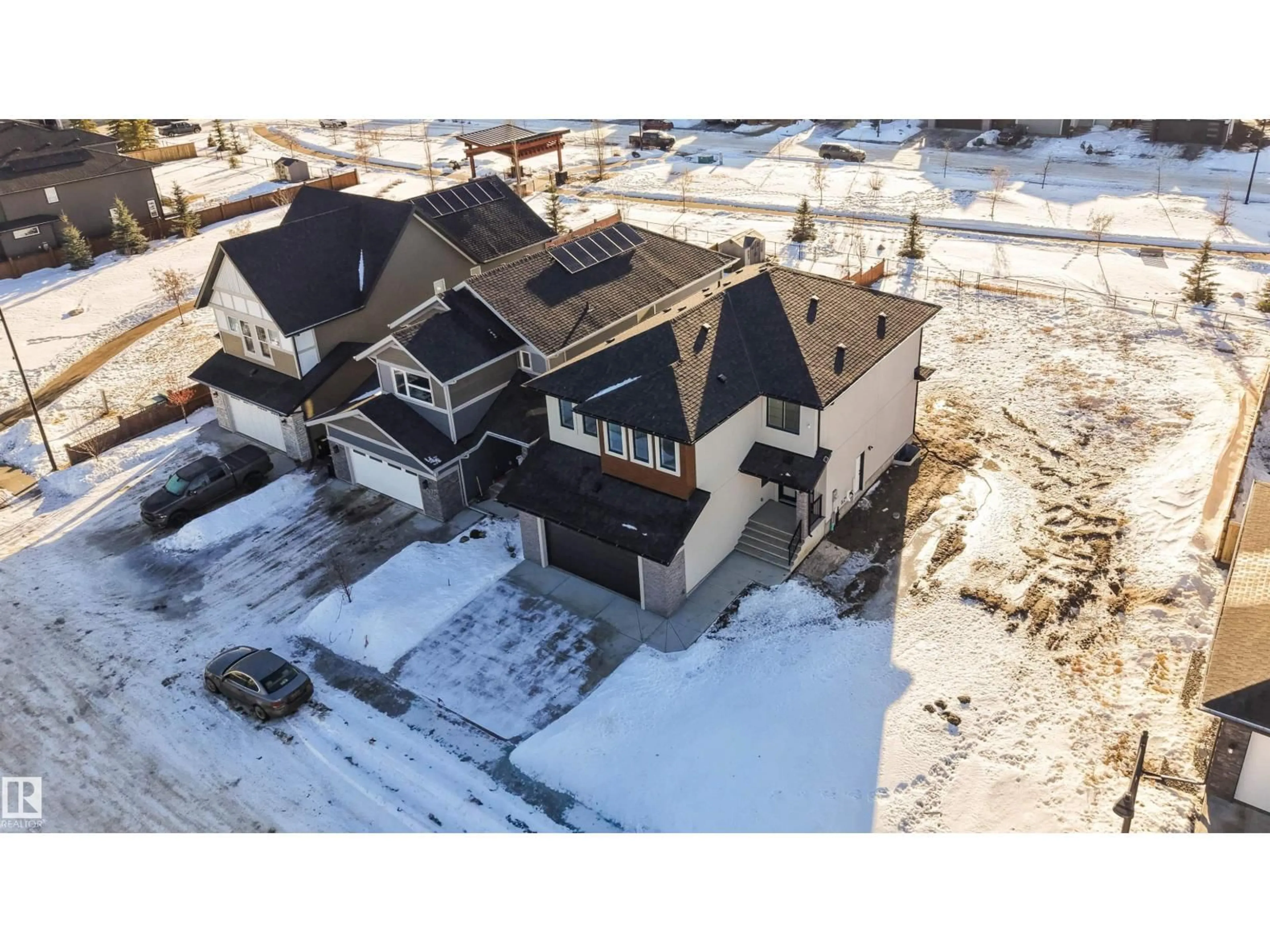 A pic from outside/outdoor area/front of a property/back of a property/a pic from drone, building for 165 EDGEWATER CIR, Leduc Alberta T9E1K5