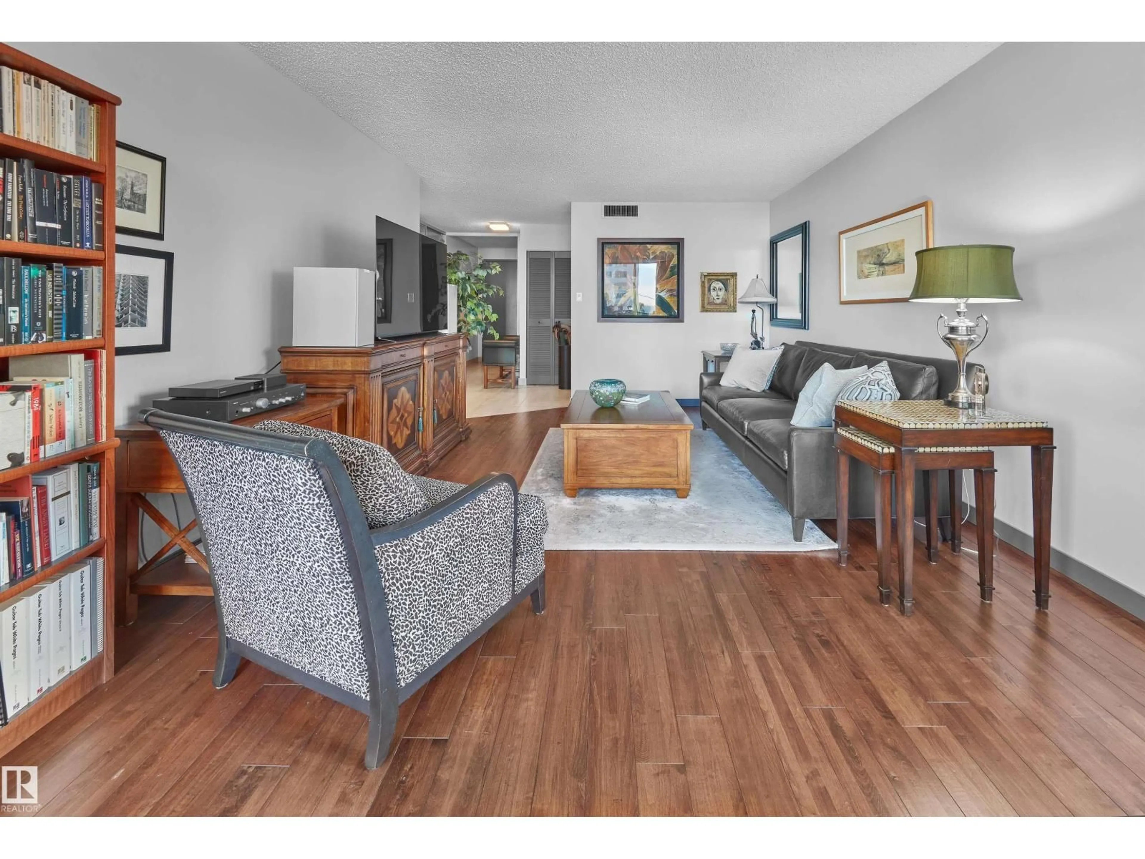 Living room with furniture, wood/laminate floor for #304 - 9921 104 ST, Edmonton Alberta T5K2K3