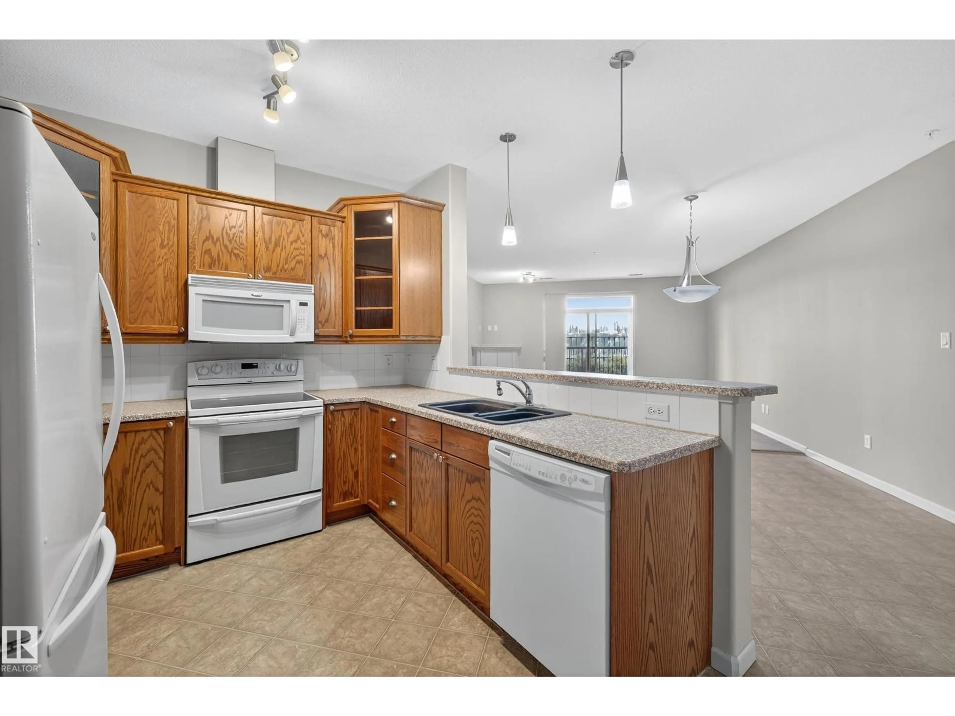 Standard kitchen, unknown for #112 - 2503 HANNA CR, Edmonton Alberta T6R0H1