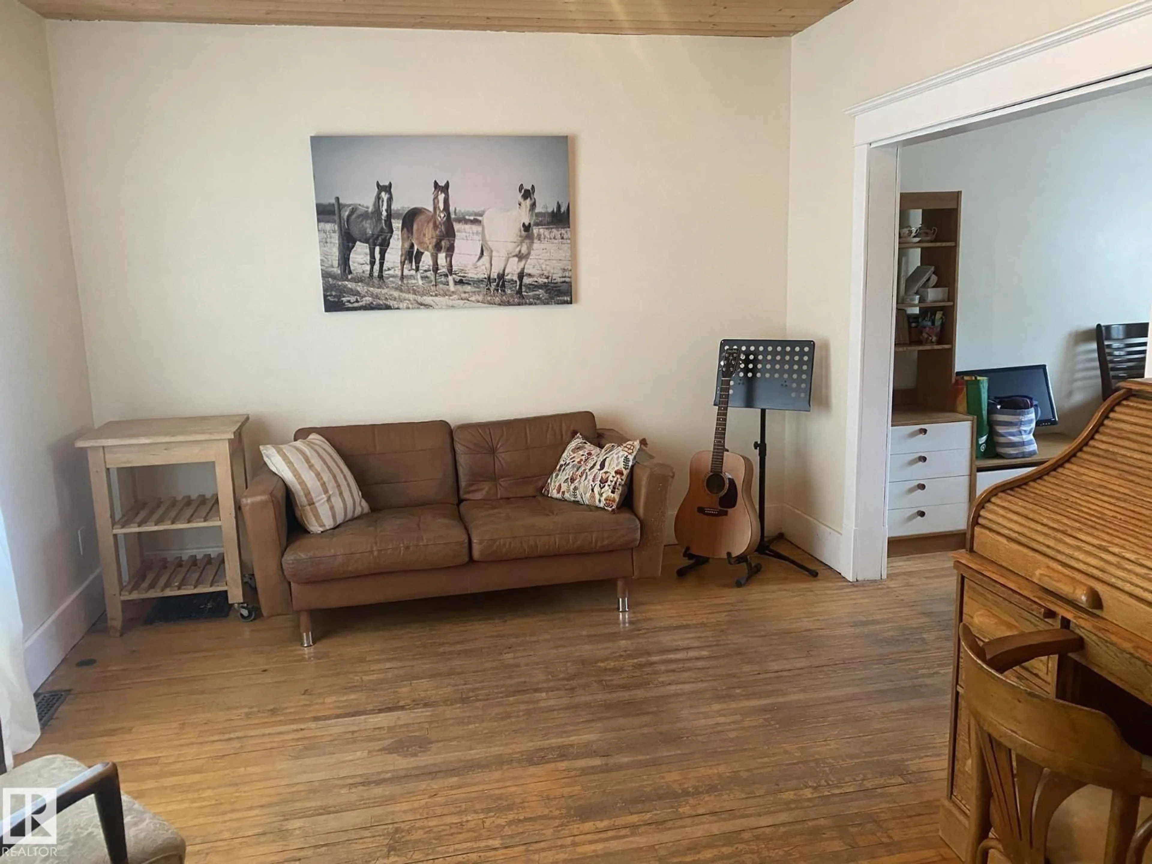 Living room with furniture, wood/laminate floor for NW - 12811 121 ST, Edmonton Alberta T5L0B1