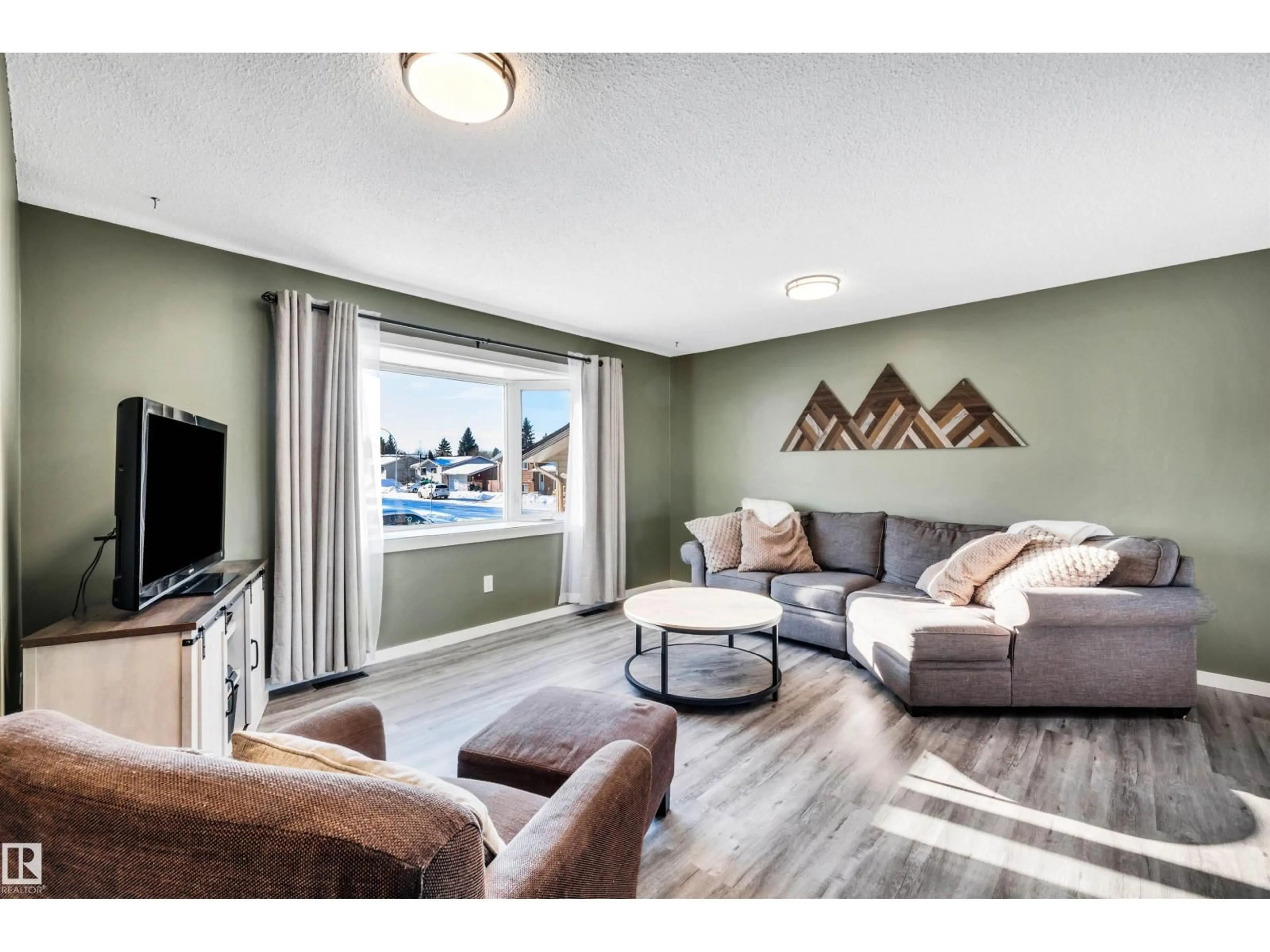 Living room with furniture, unknown for NW - 8612 33 AV, Edmonton Alberta T6K2Y1