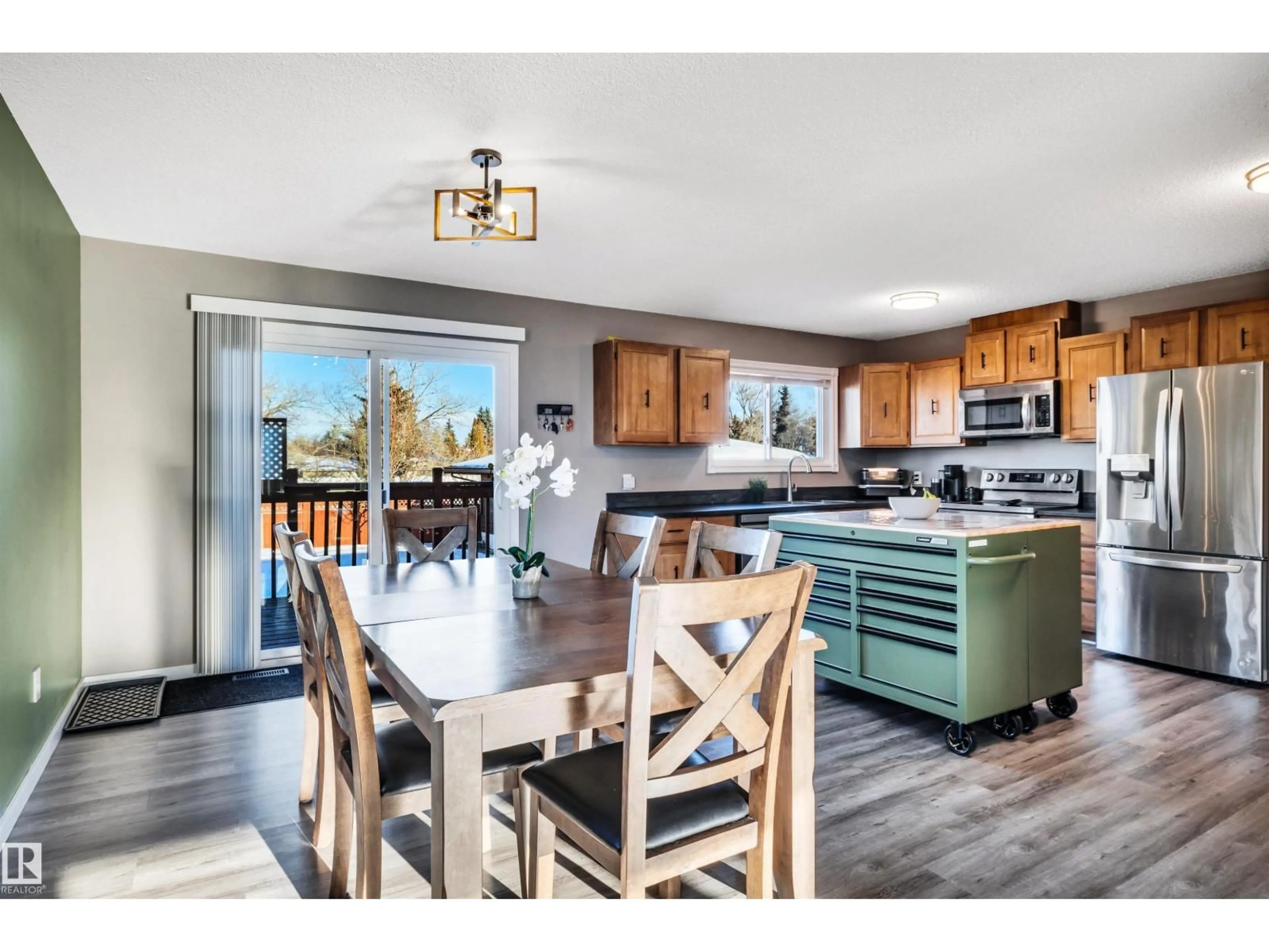 Open concept kitchen, wood/laminate floor for NW - 8612 33 AV, Edmonton Alberta T6K2Y1