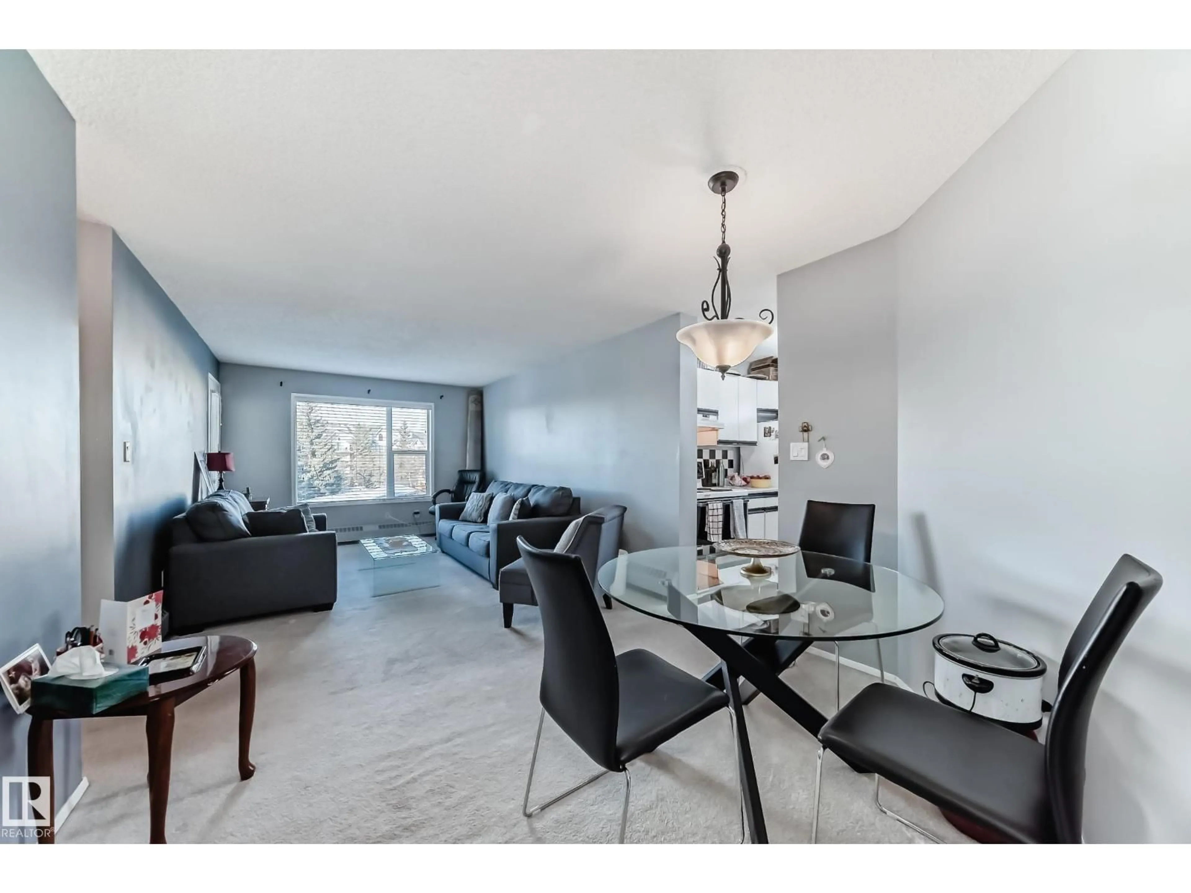 Living room with furniture, unknown for 347 - 10520 120 ST, Edmonton Alberta T5H4L7