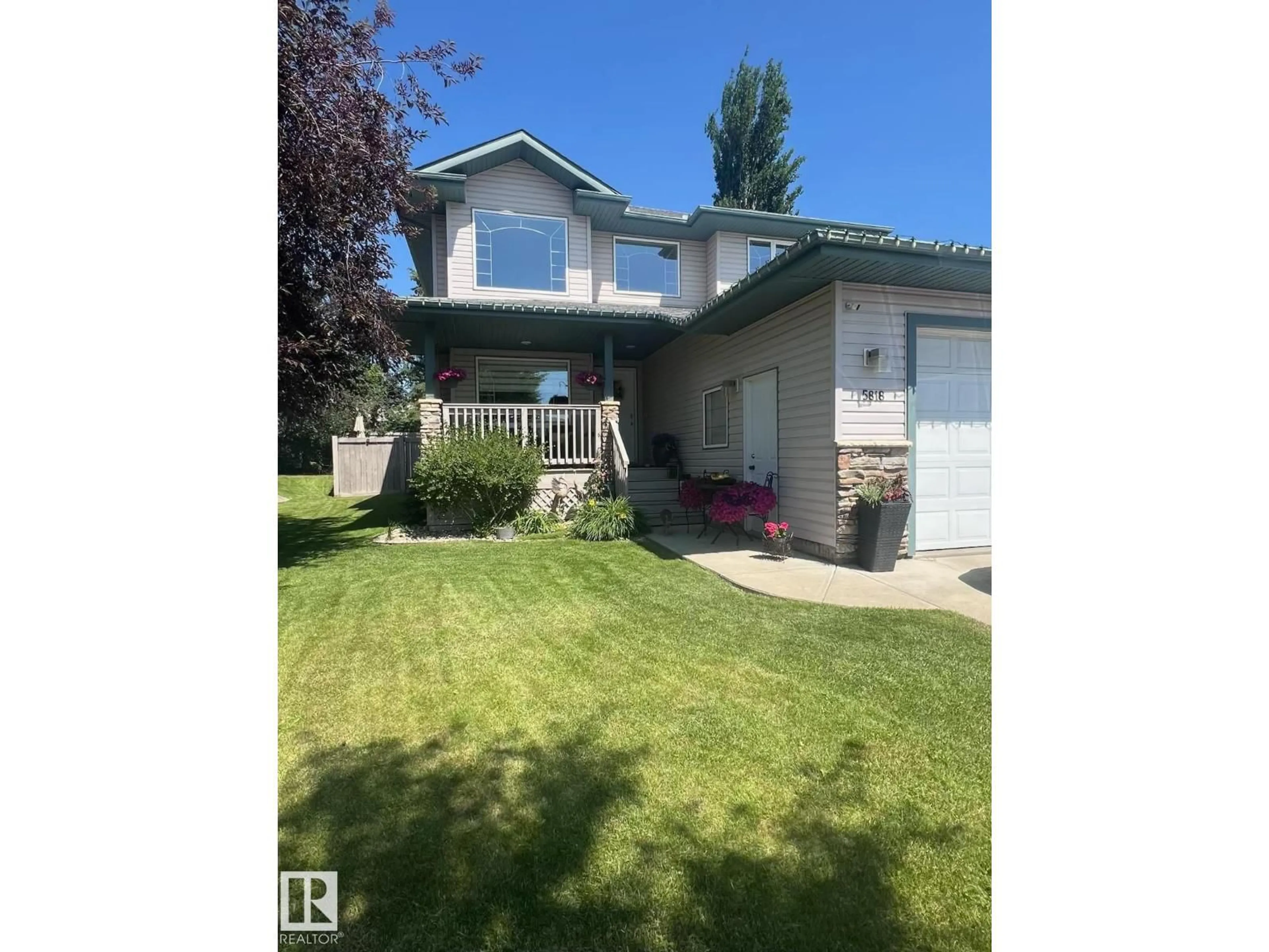 Home with vinyl exterior material, street for 5818 47 AV, Beaumont Alberta T4X1N9