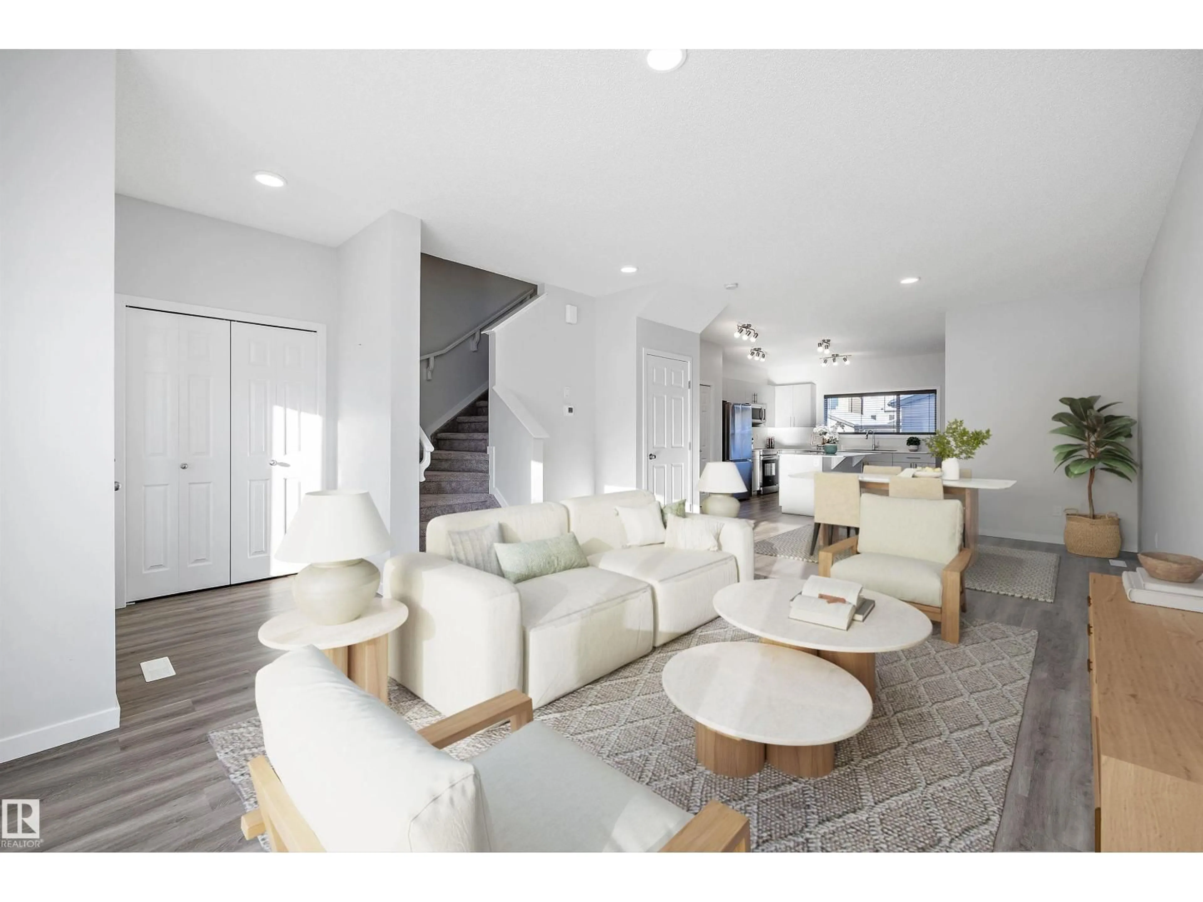 Living room with furniture, ceramic/tile floor for 5210 LARK CR, Edmonton Alberta T5S0S3