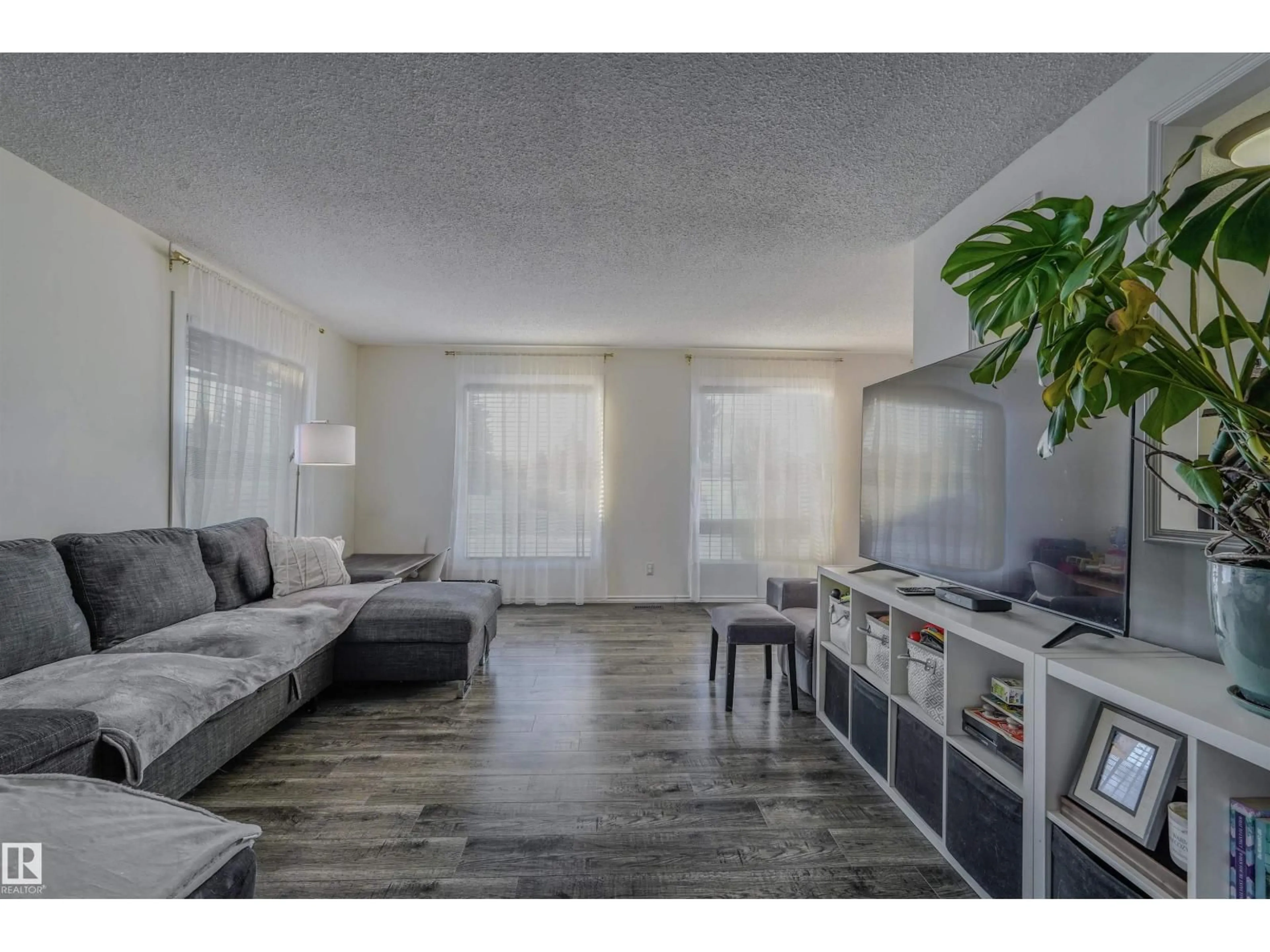 Living room with furniture, unknown for 12403 156 AV NW, Edmonton Alberta T5X2X4