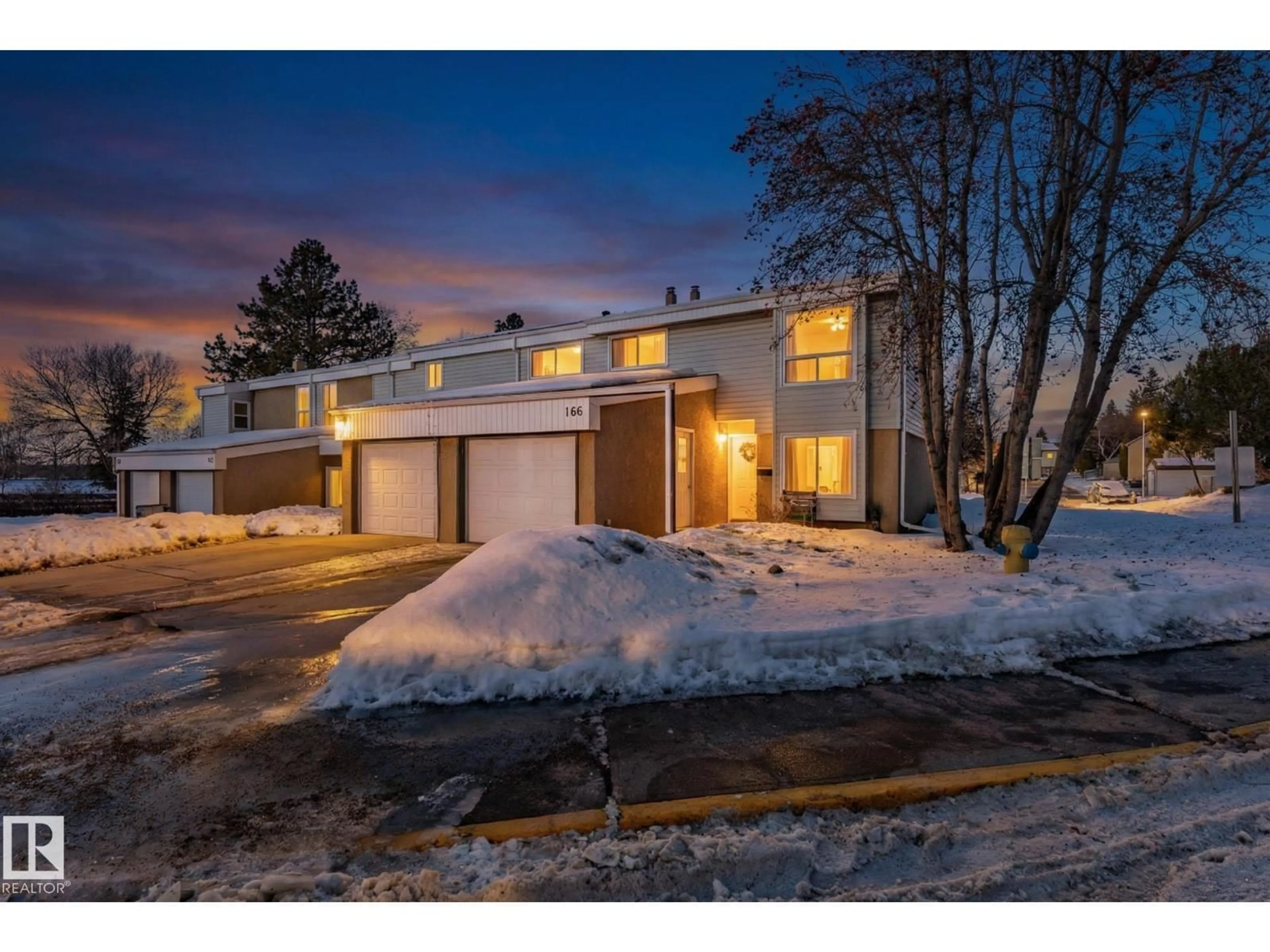 A pic from outside/outdoor area/front of a property/back of a property/a pic from drone, street for NW - 166 GRANDIN VG, St. Albert Alberta T8N2J3