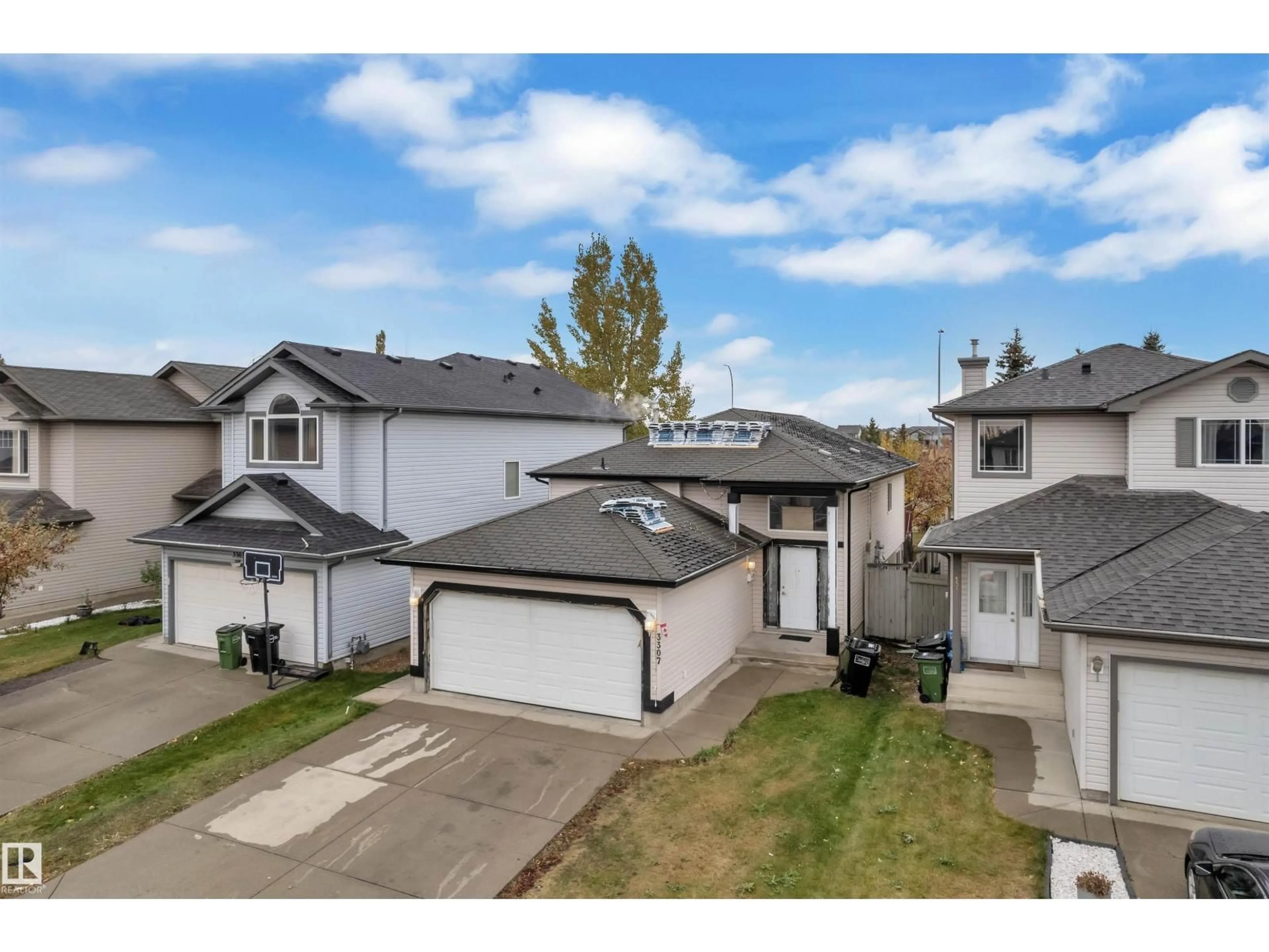 A pic from outside/outdoor area/front of a property/back of a property/a pic from drone, street for 3307 24 AV, Edmonton Alberta T6T1Y6