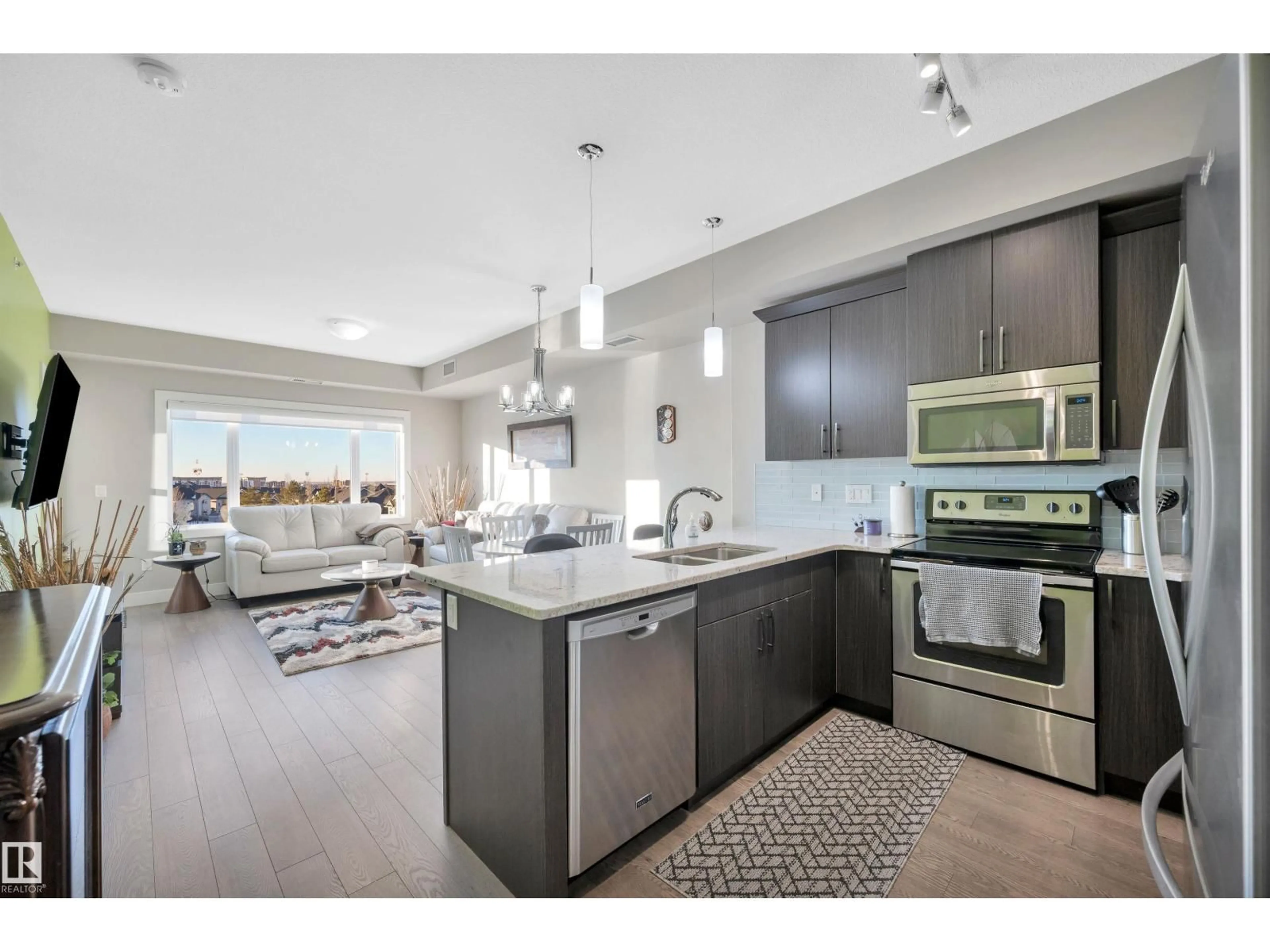 Open concept kitchen, ceramic/tile floor for 403 - 5001 ETON BV, Sherwood Park Alberta T8H0N7