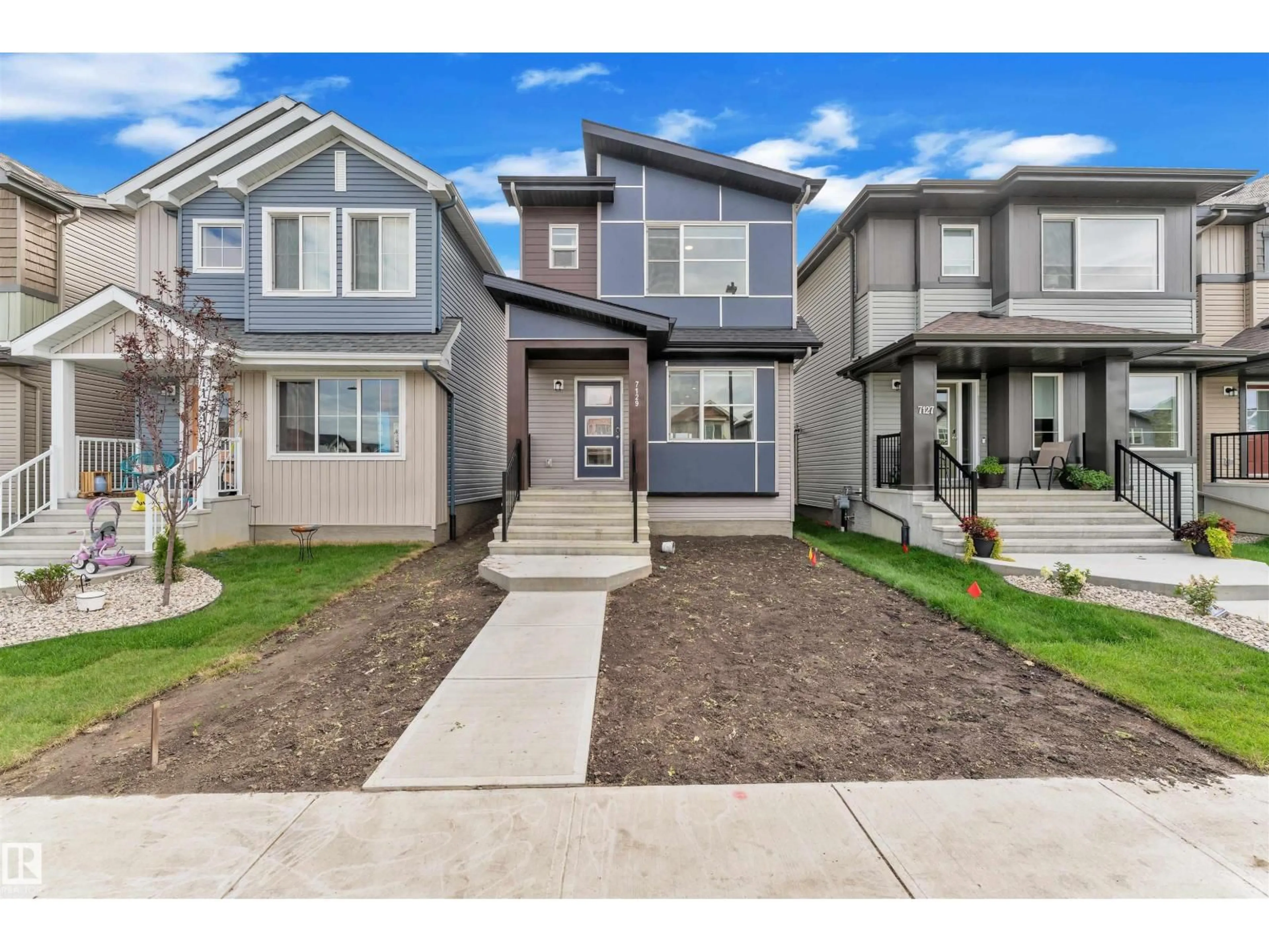 Home with vinyl exterior material, street for 7129 46A ST, Beaumont Alberta T4X3A8