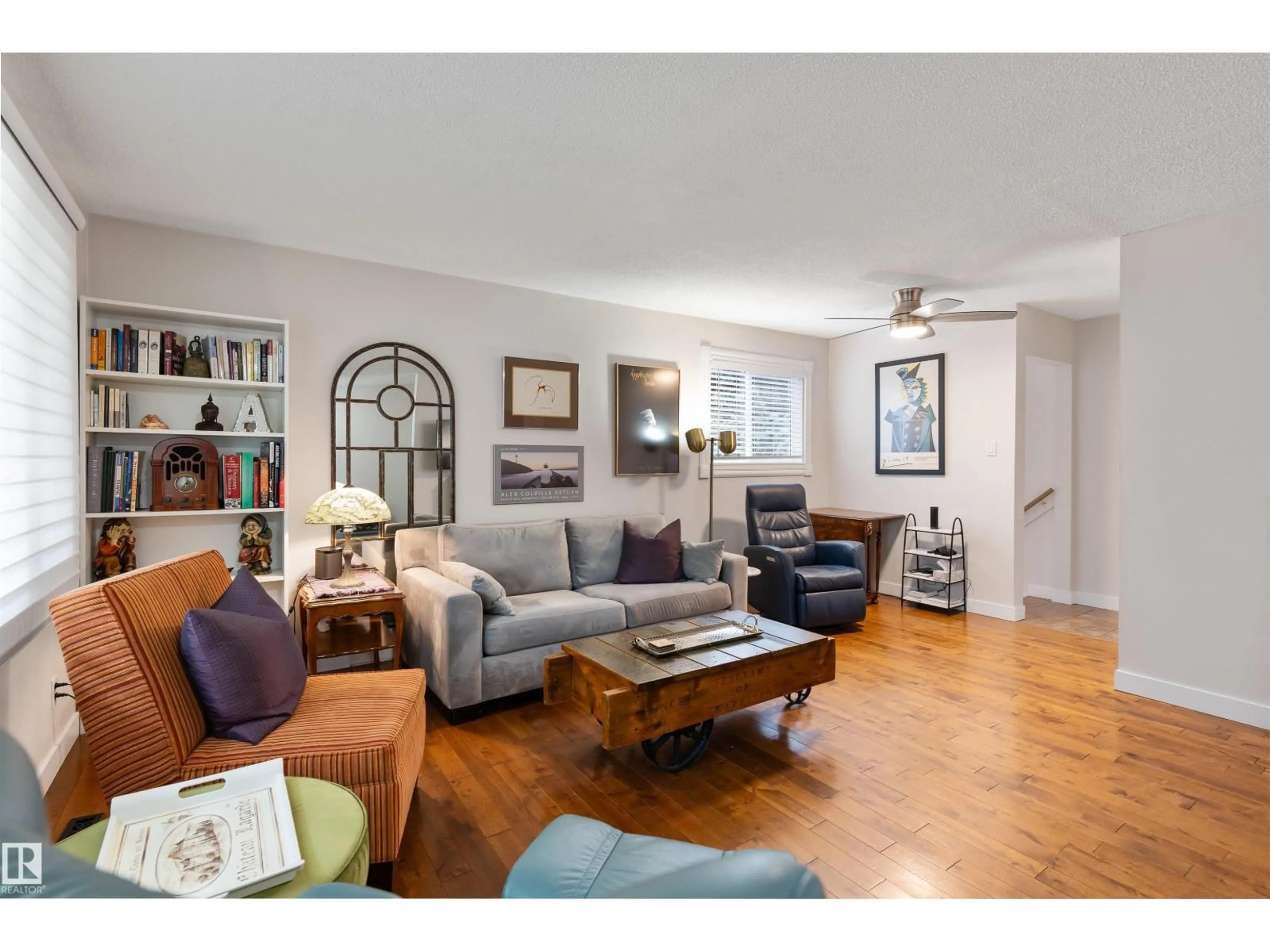 Living room with furniture, wood/laminate floor for 35 STANLEY DR, St. Albert Alberta T8N0J6