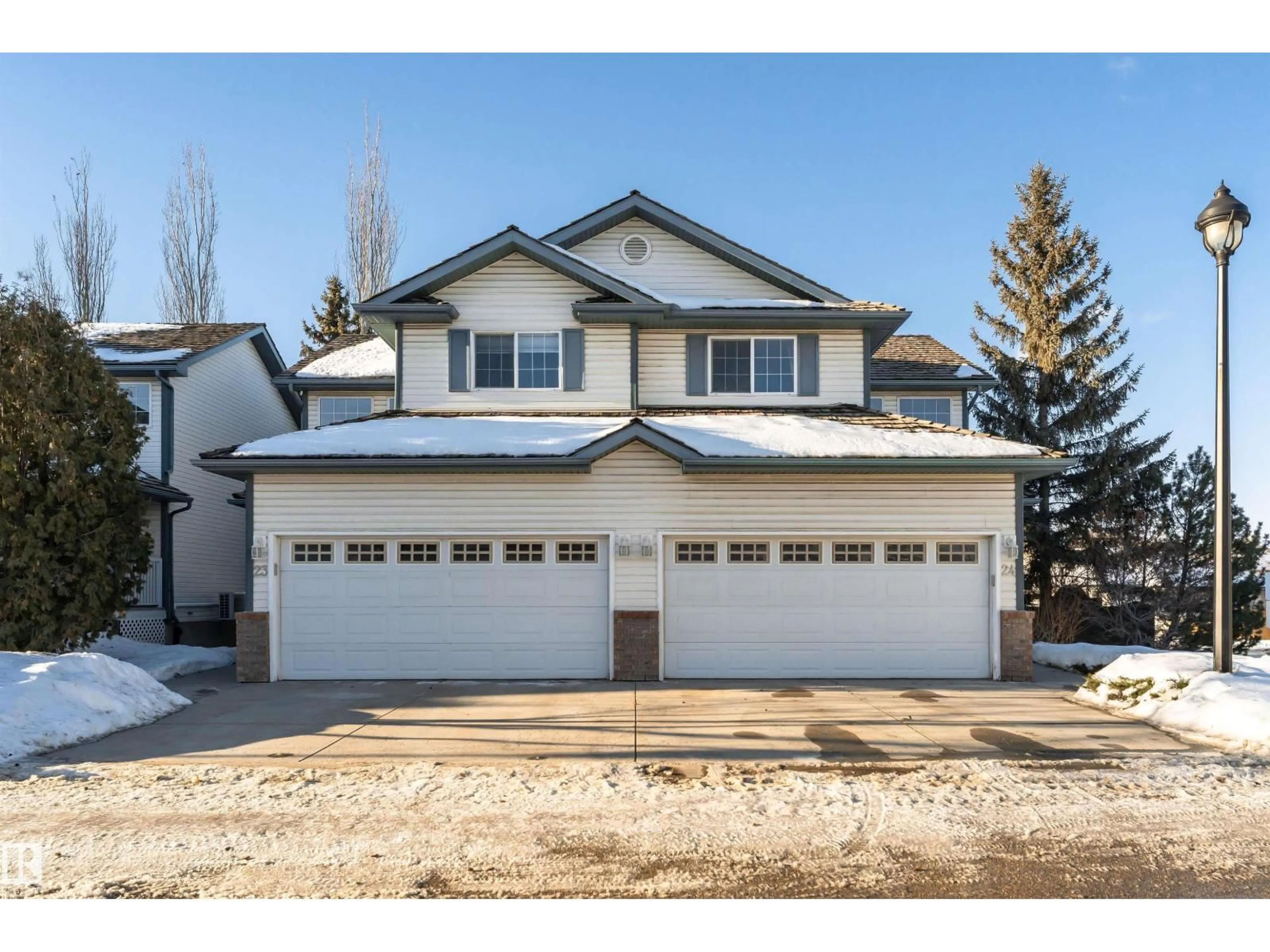 Home with vinyl exterior material, street for 211 - 24 BLACKBURN DR, Edmonton Alberta T6W1C8