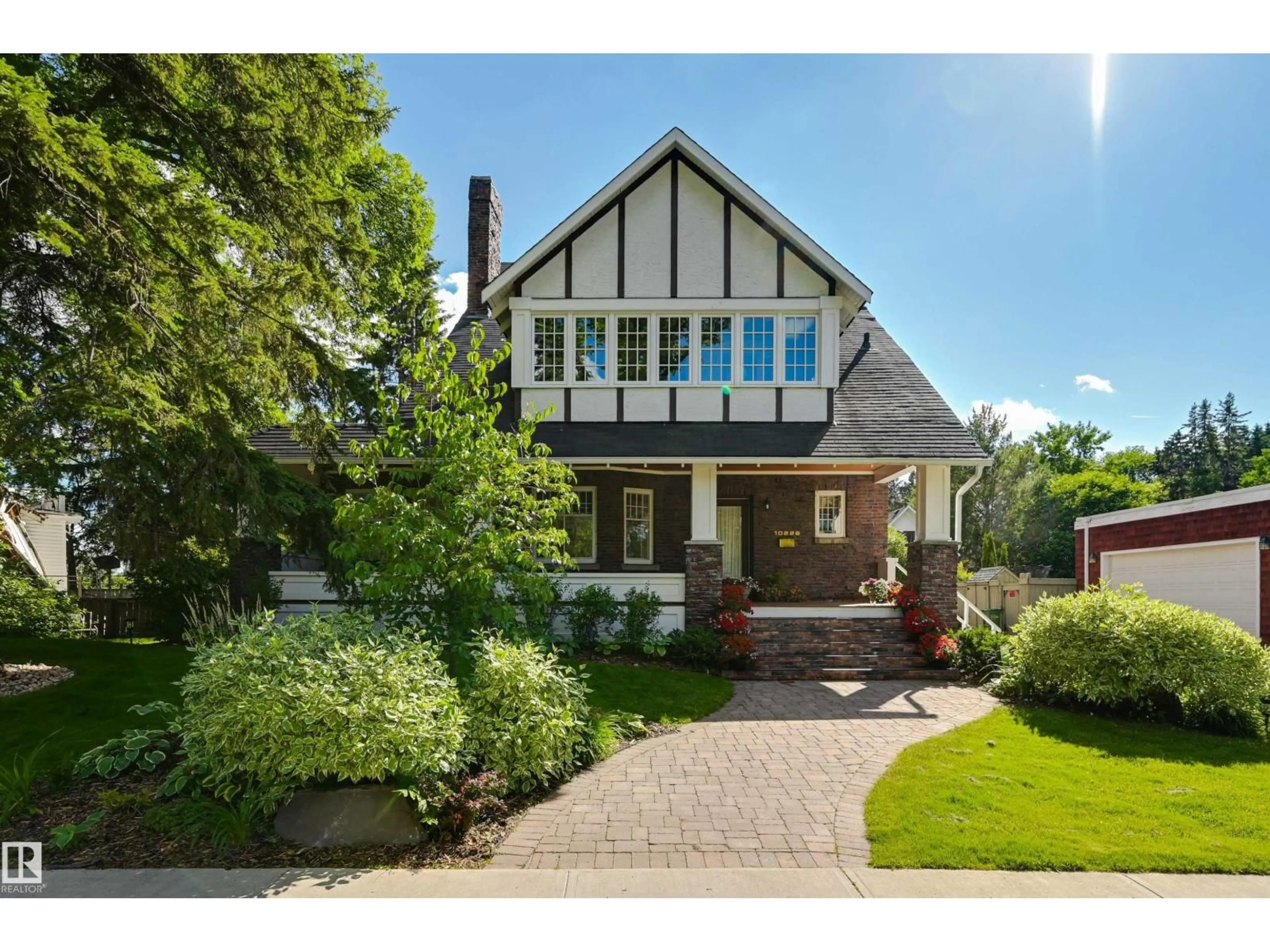 Home with brick exterior material, street for 10226 CONNAUGHT DR, Edmonton Alberta T5N3J2