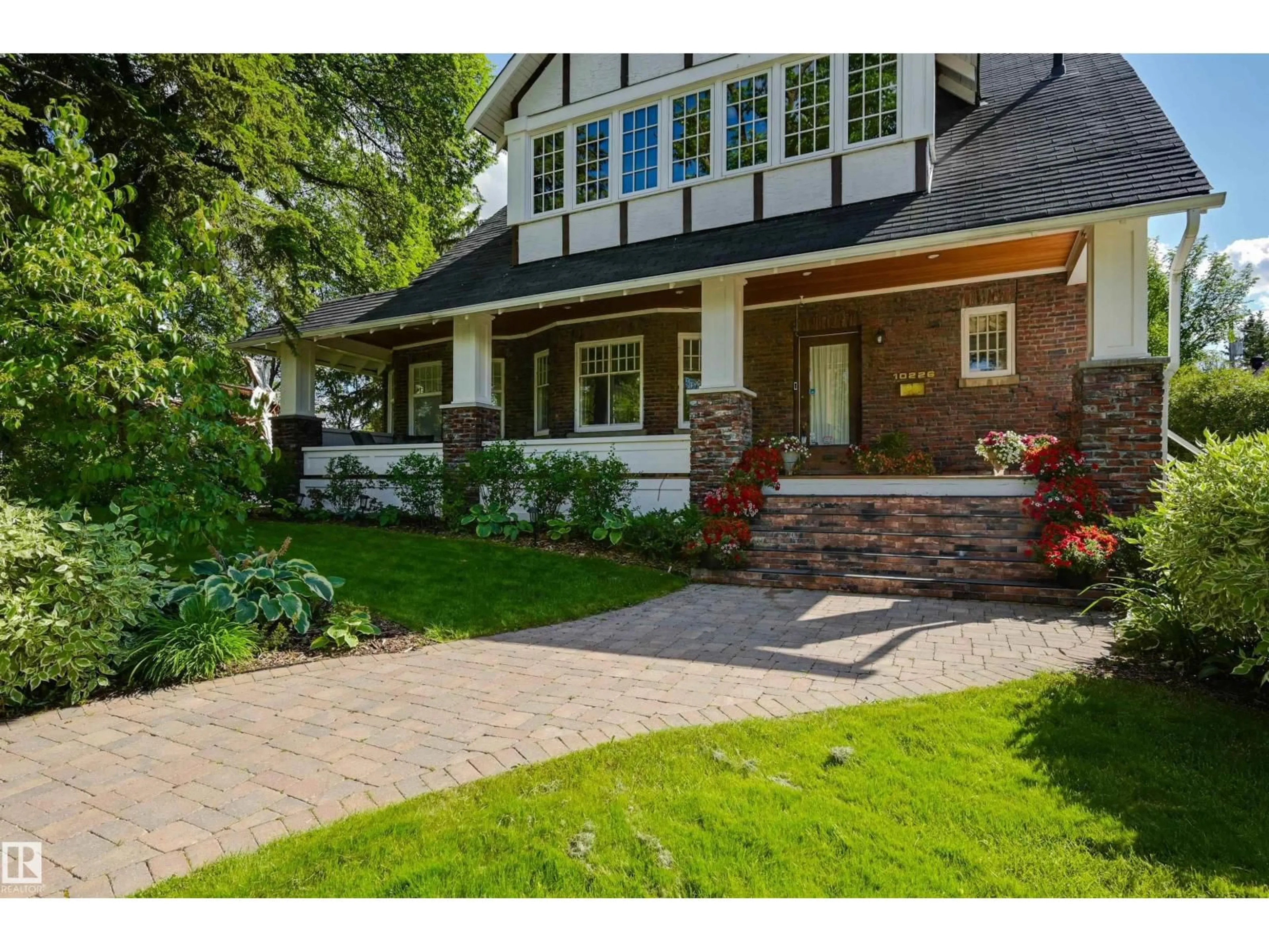 Home with brick exterior material, street for 10226 CONNAUGHT DR, Edmonton Alberta T5N3J2