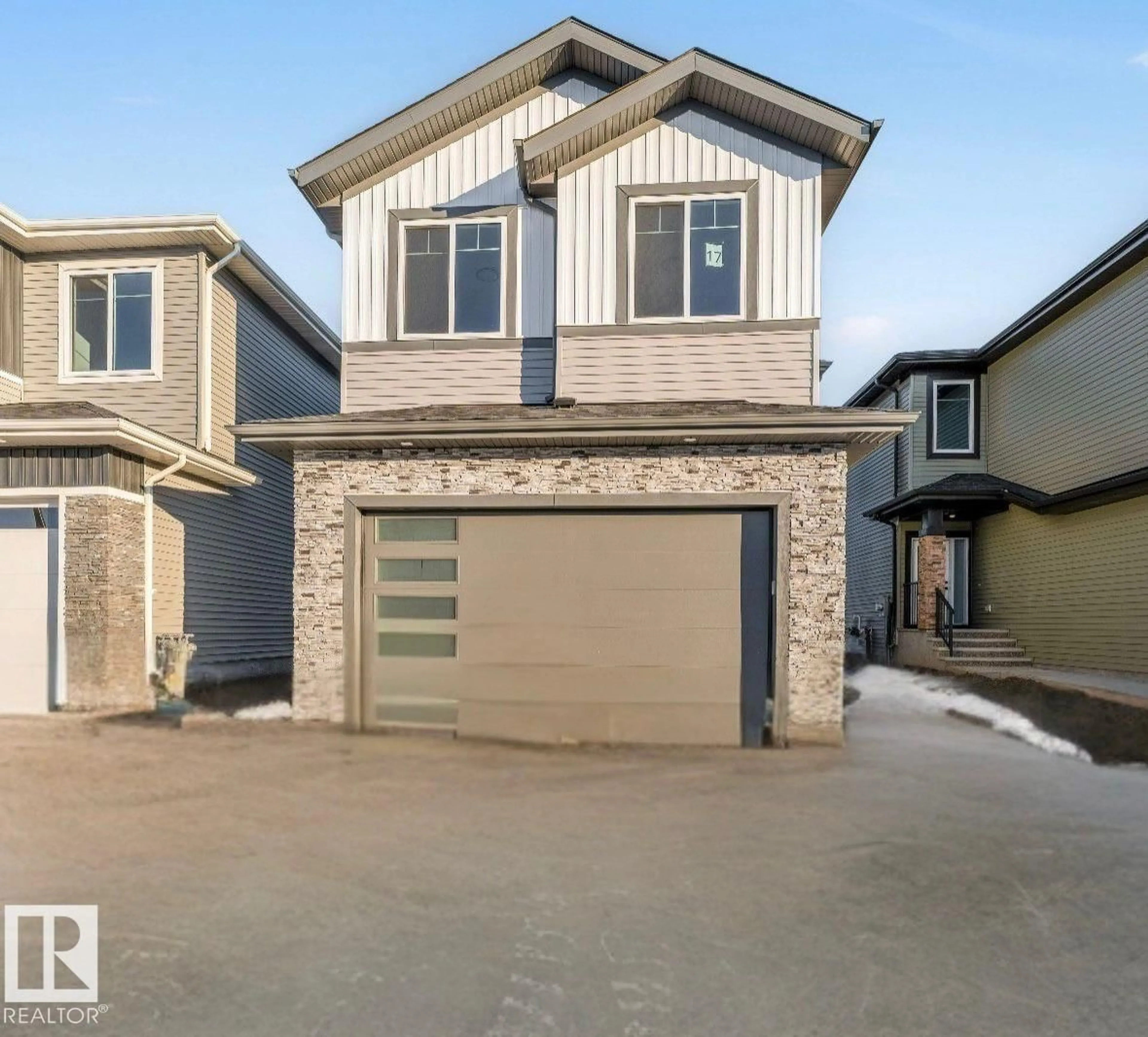 Home with vinyl exterior material, street for 17 AXELWOOD CR, Spruce Grove Alberta T7X0Y3