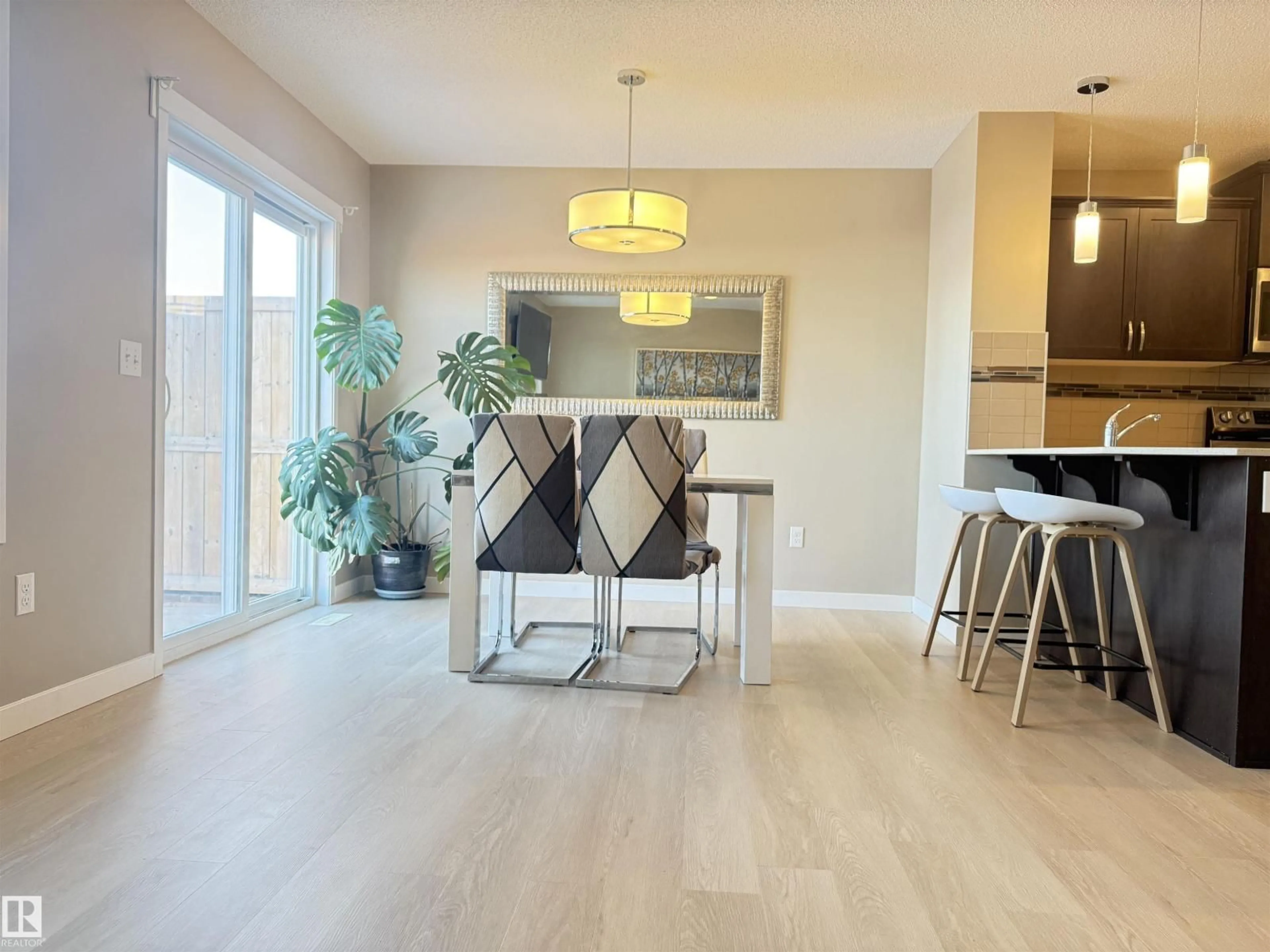 Open concept kitchen, wood/laminate floor for NW - 17633 120 ST, Edmonton Alberta T5X0K8