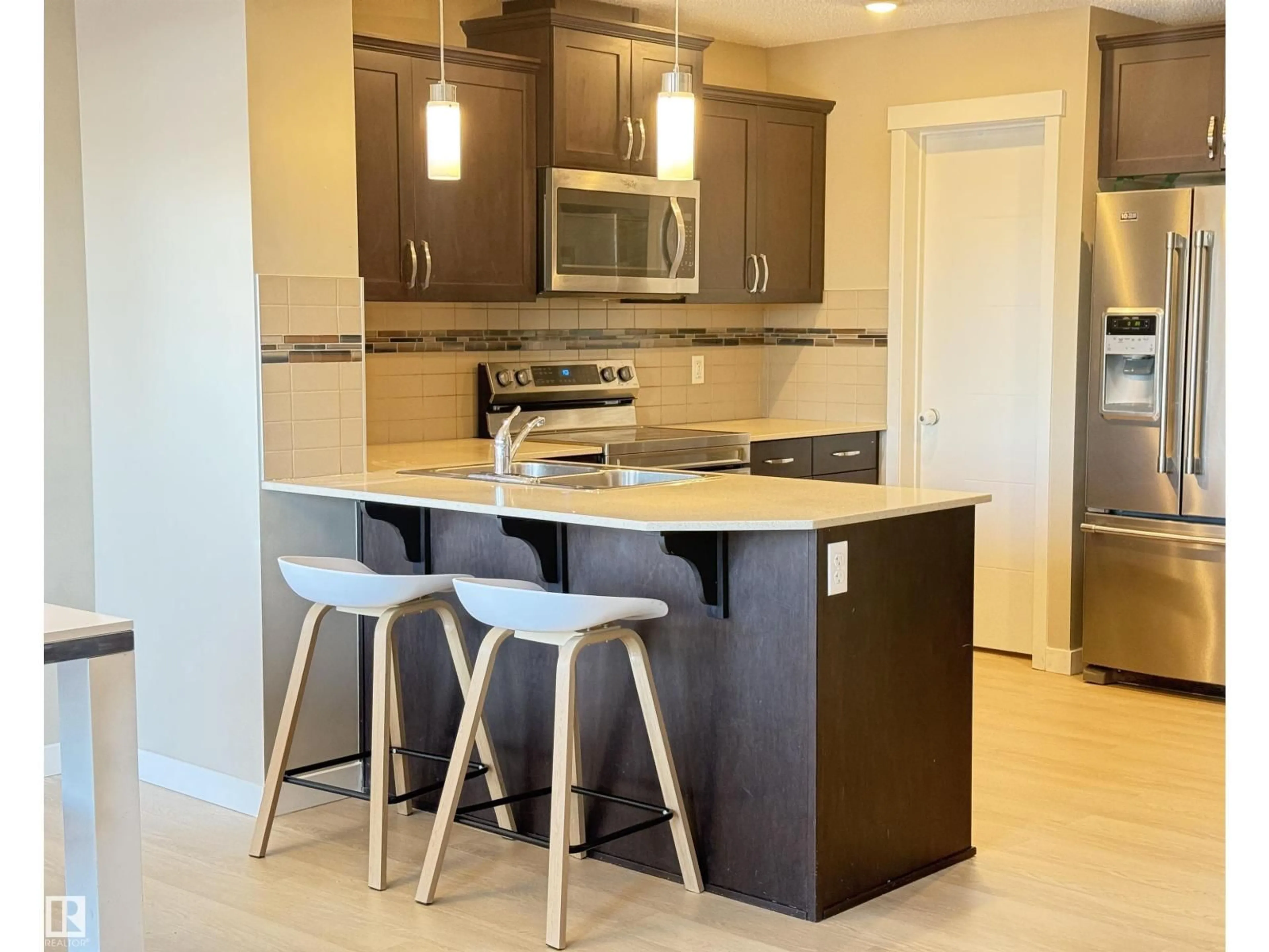 Open concept kitchen, ceramic/tile floor for NW - 17633 120 ST, Edmonton Alberta T5X0K8