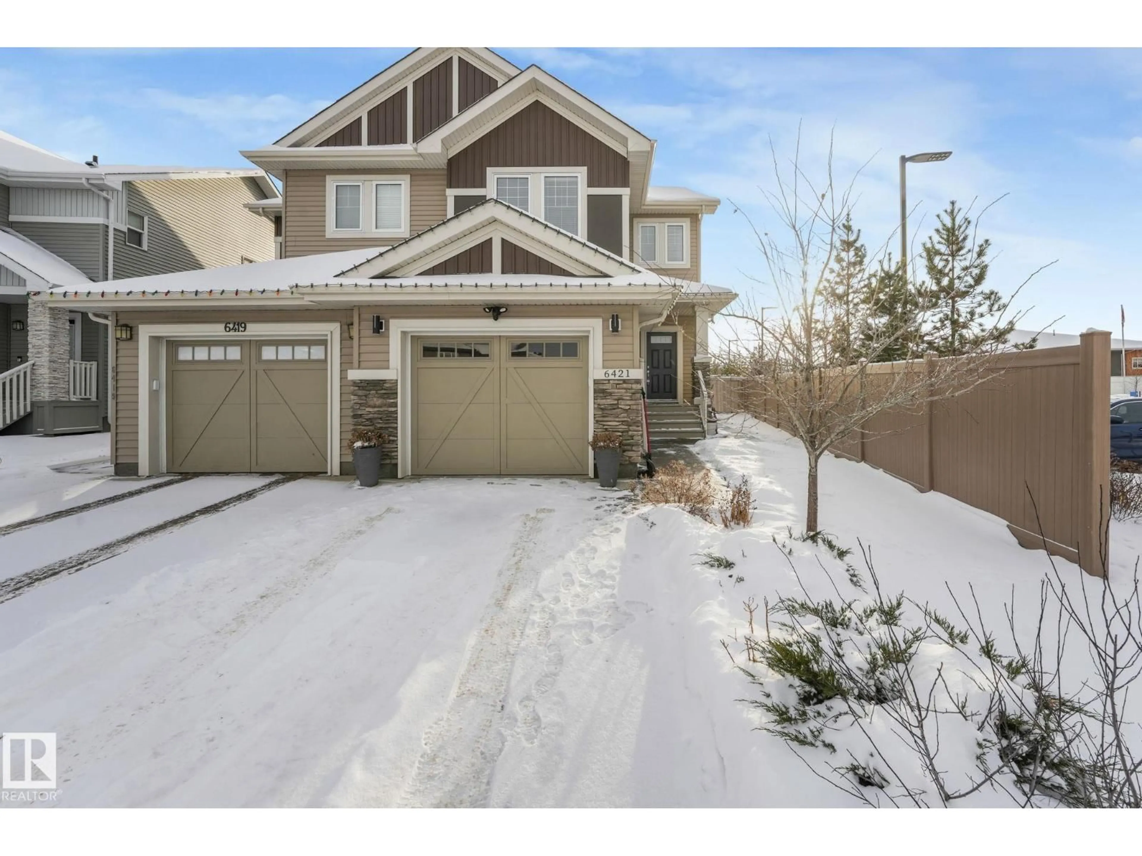 A pic from outside/outdoor area/front of a property/back of a property/a pic from drone, street for 6421 170 AV, Edmonton Alberta T5Y3P9