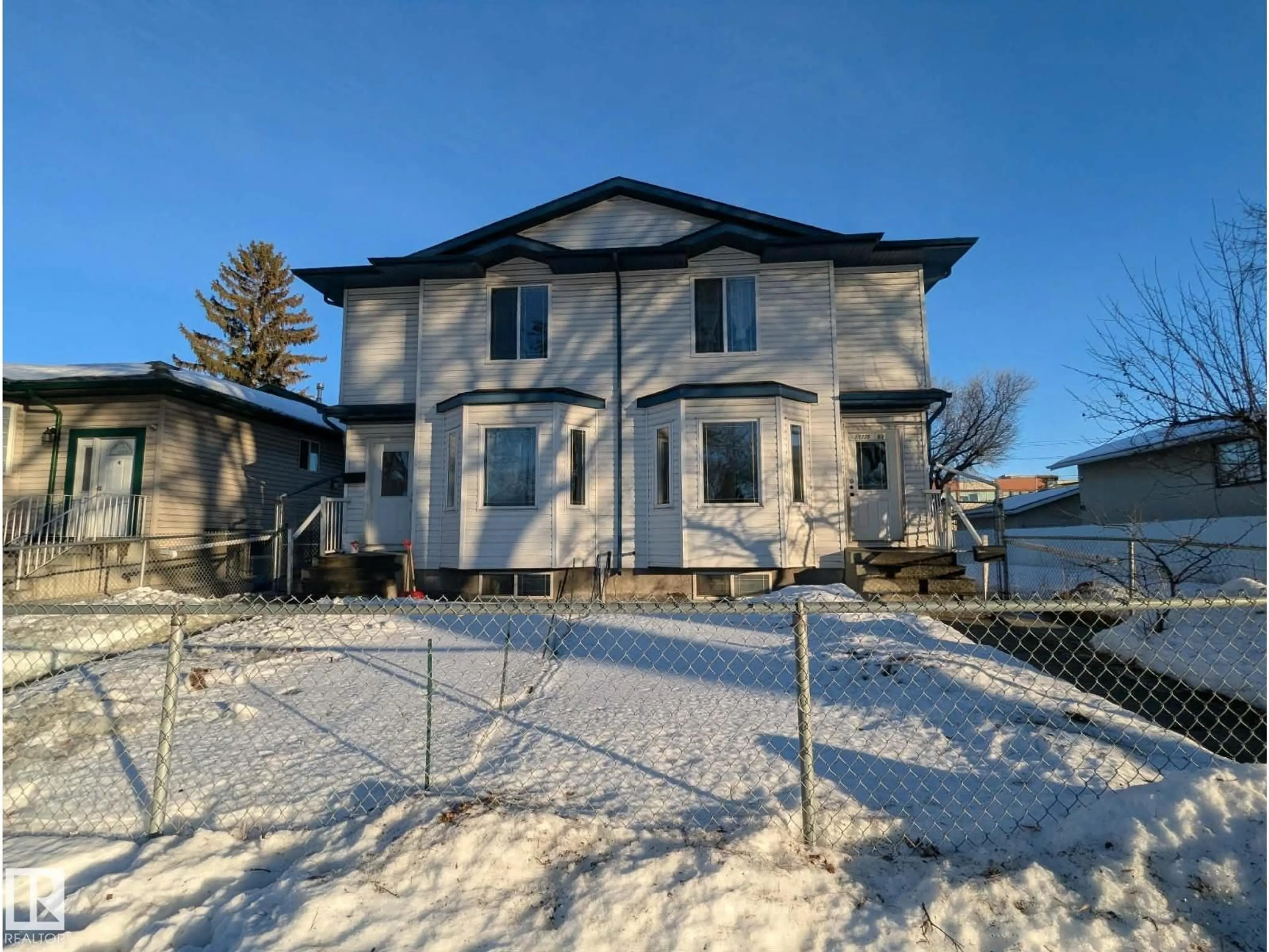 A pic from outside/outdoor area/front of a property/back of a property/a pic from drone, street for 11725 83 ST, Edmonton Alberta T5B2Z1