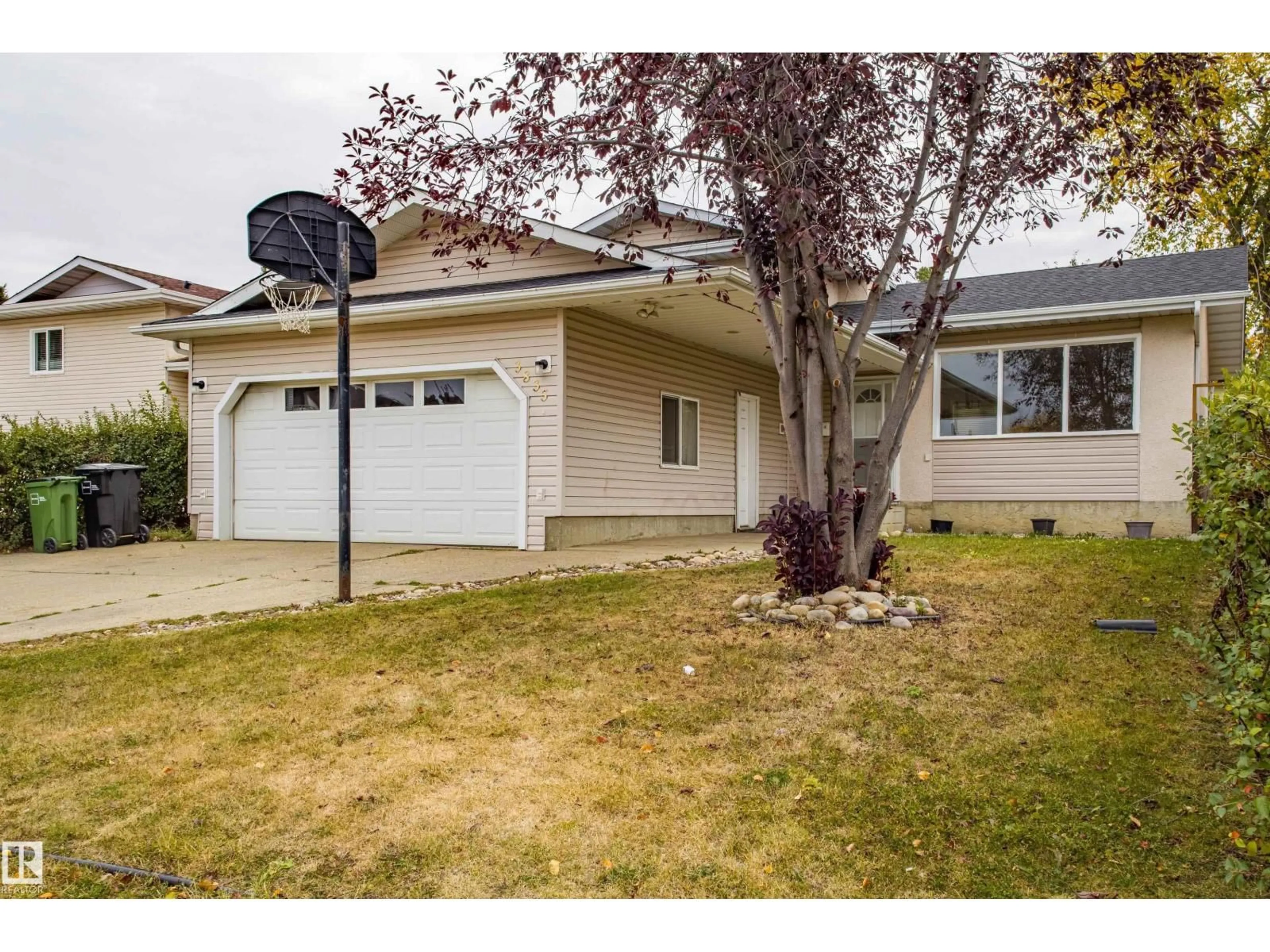 Home with vinyl exterior material, street for NW - 3835 47 ST, Edmonton Alberta T6L5B3