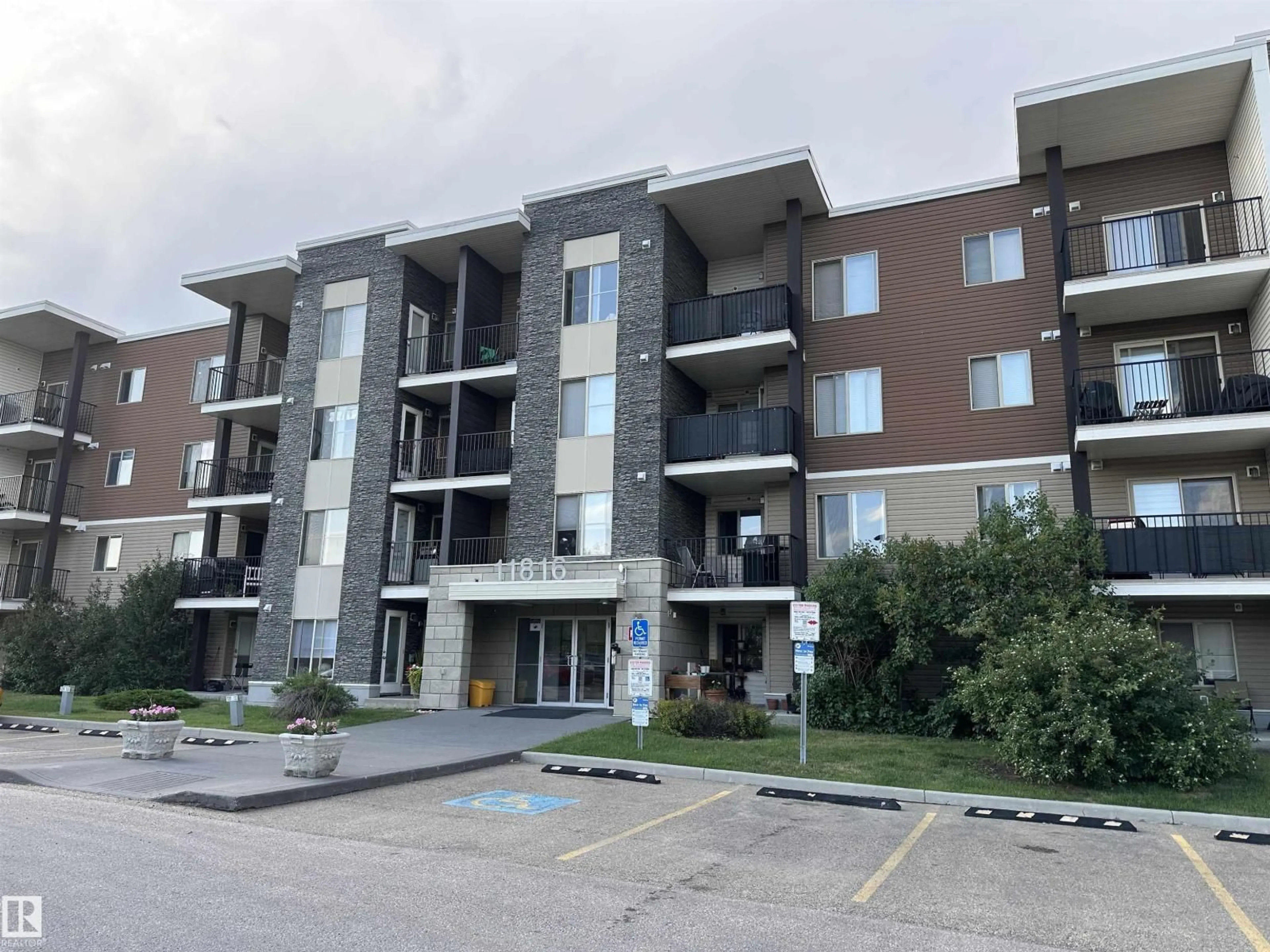 A pic from outside/outdoor area/front of a property/back of a property/a pic from drone, building for #205 - 11816 22 AV, Edmonton Alberta T6W2A2