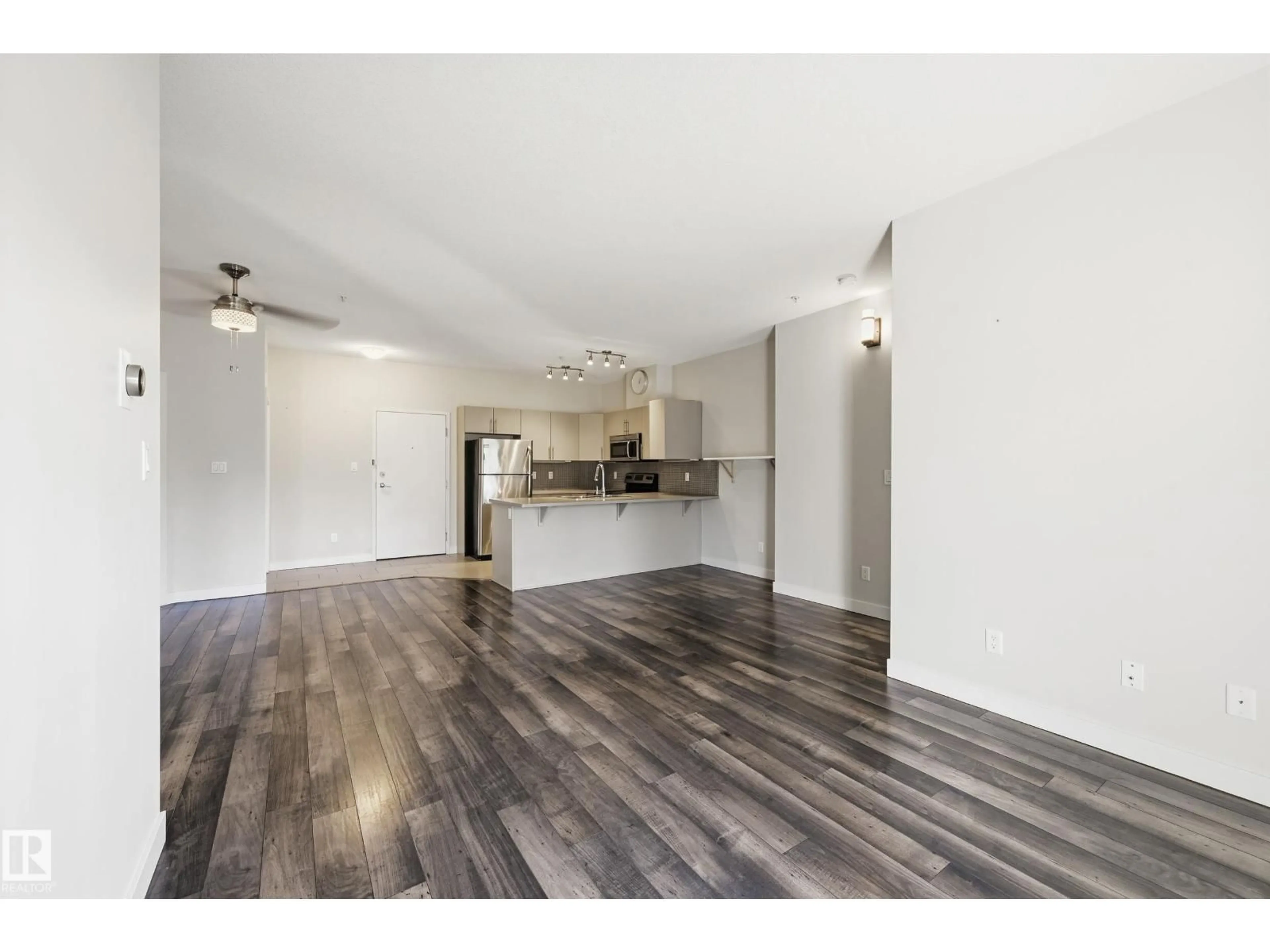 Open concept kitchen, wood/laminate floor for 315 - 10611 117 ST NW, Edmonton Alberta T5H0G6