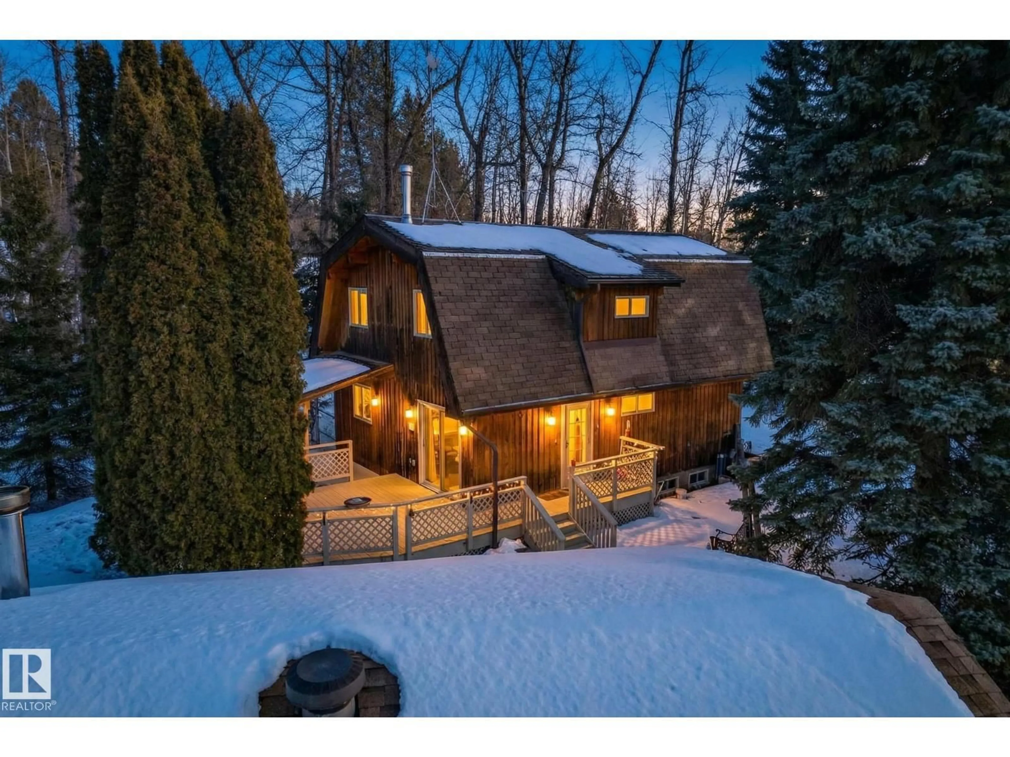 A pic from outside/outdoor area/front of a property/back of a property/a pic from drone, mountain view for 700 LAKESIDE DR, Rural Parkland County Alberta T7Z2V7