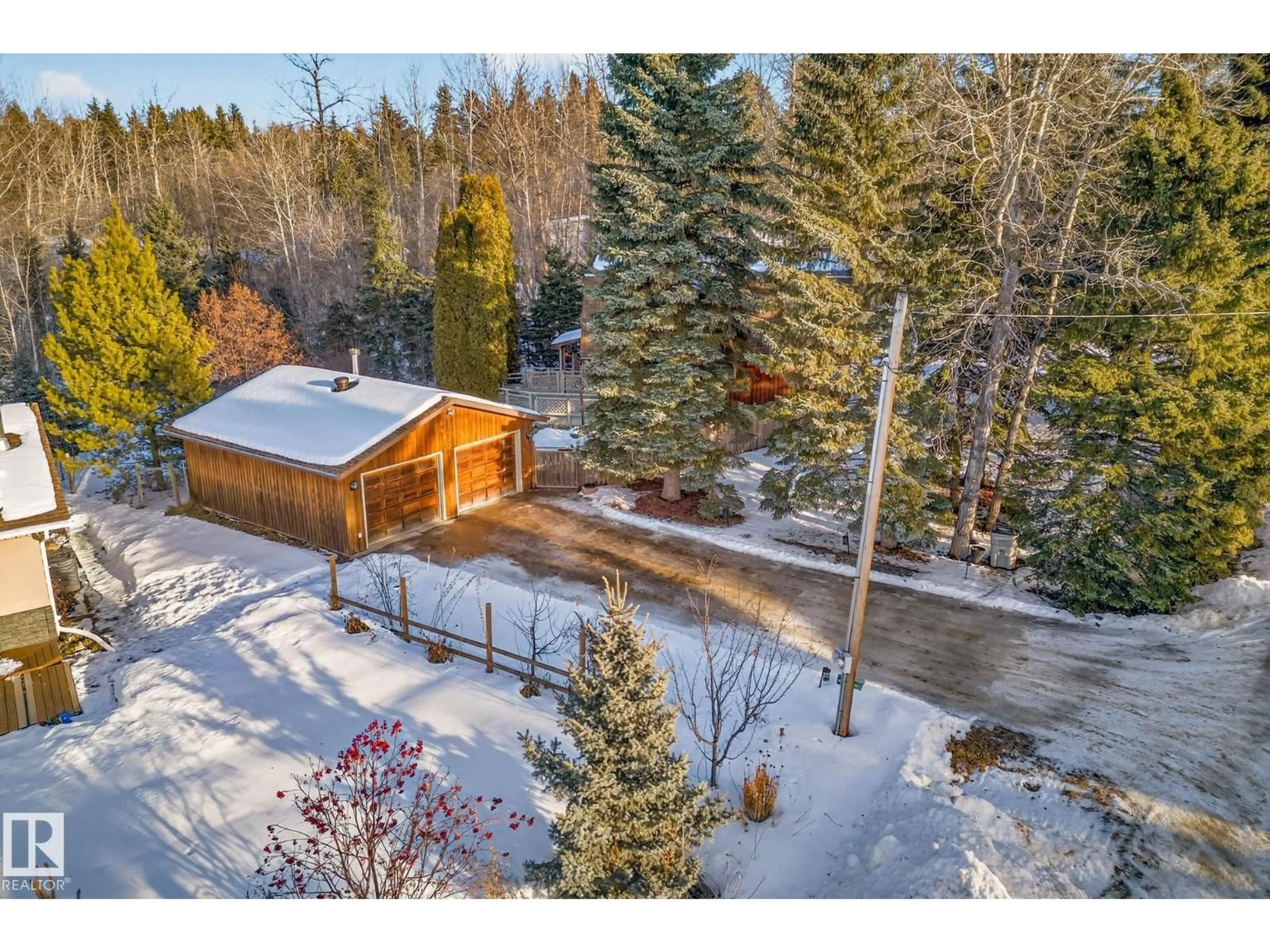 A pic from outside/outdoor area/front of a property/back of a property/a pic from drone, forest/trees view for 700 LAKESIDE DR, Rural Parkland County Alberta T7Z2V7