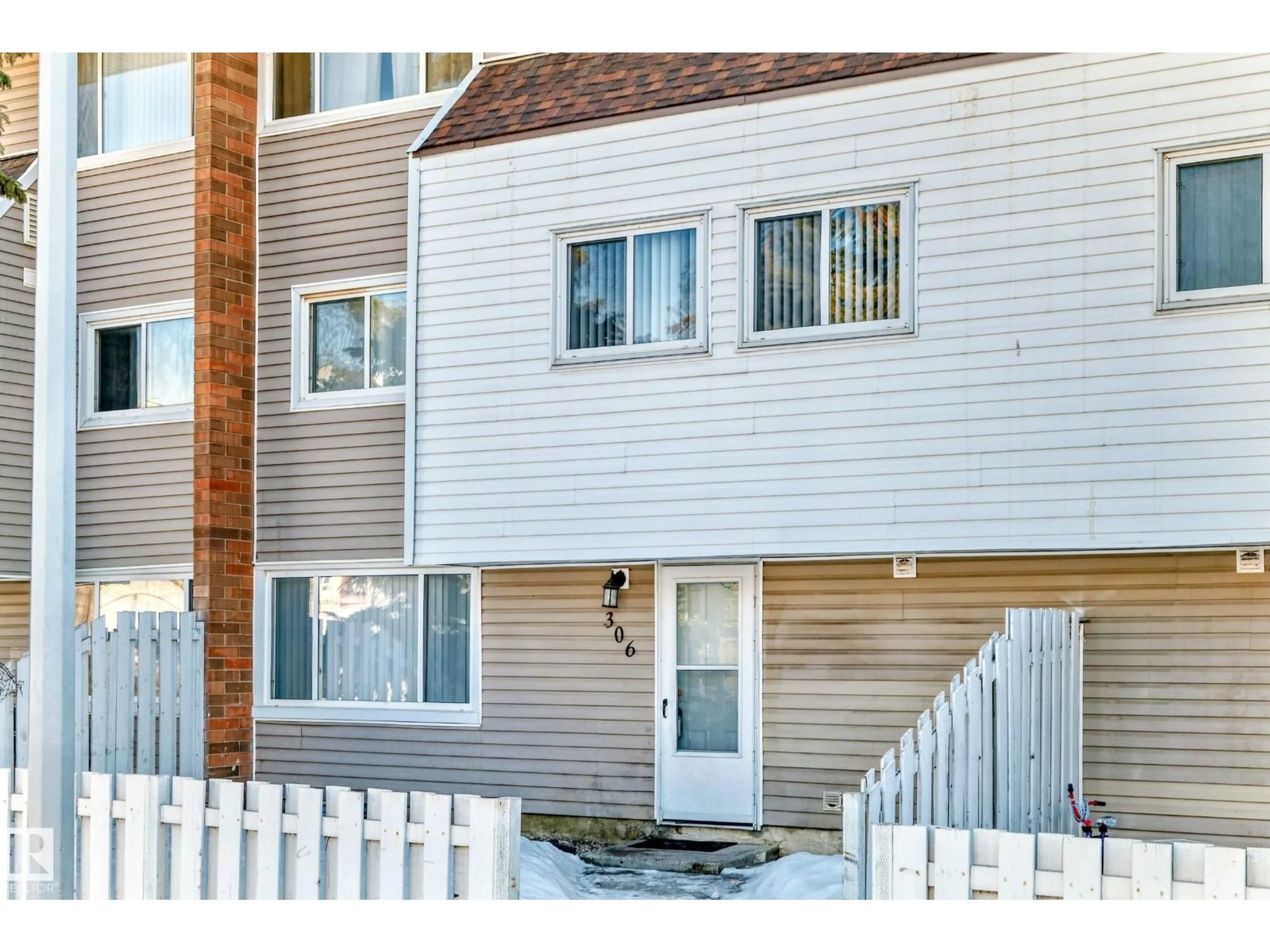 Home with vinyl exterior material, street for #306 - 2908 116A AV, Edmonton Alberta T5W4R7