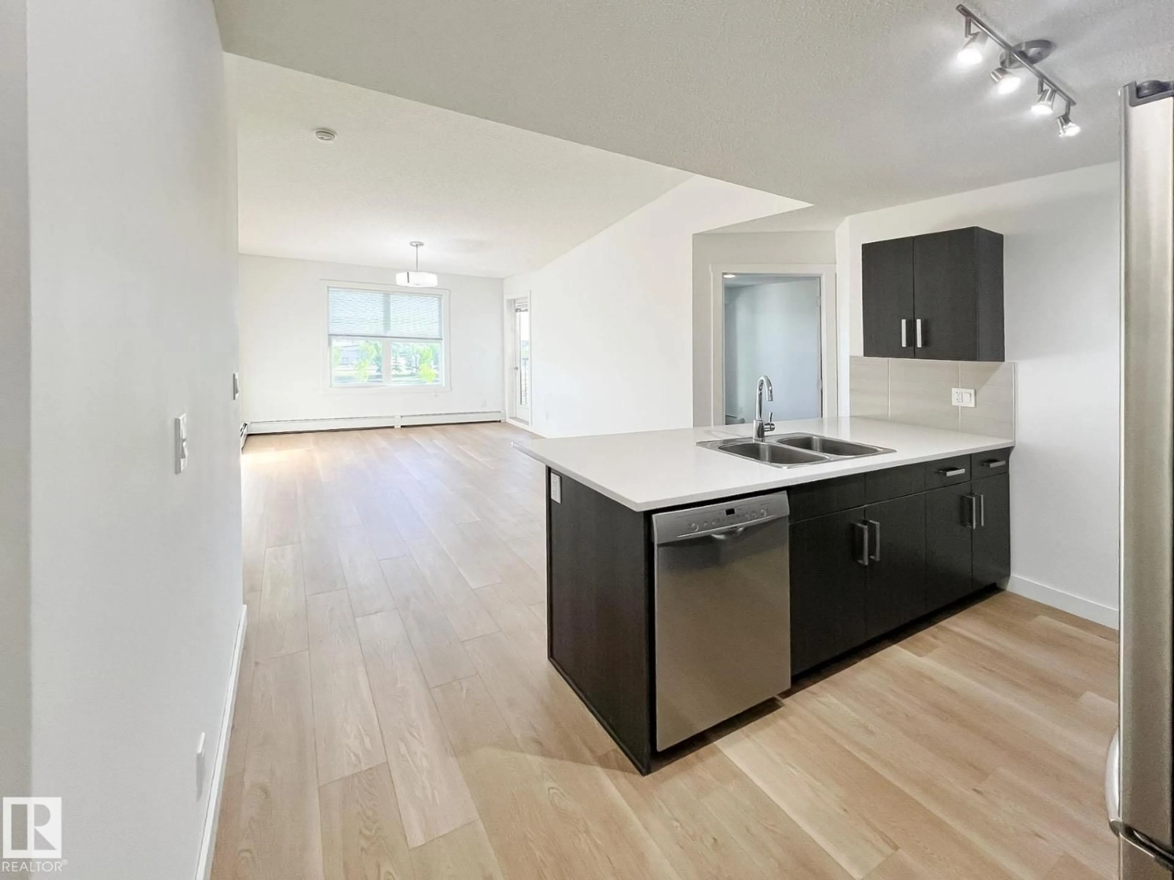 Open concept kitchen, unknown for 406 - 667 WATT BV, Edmonton Alberta T6X0Y2