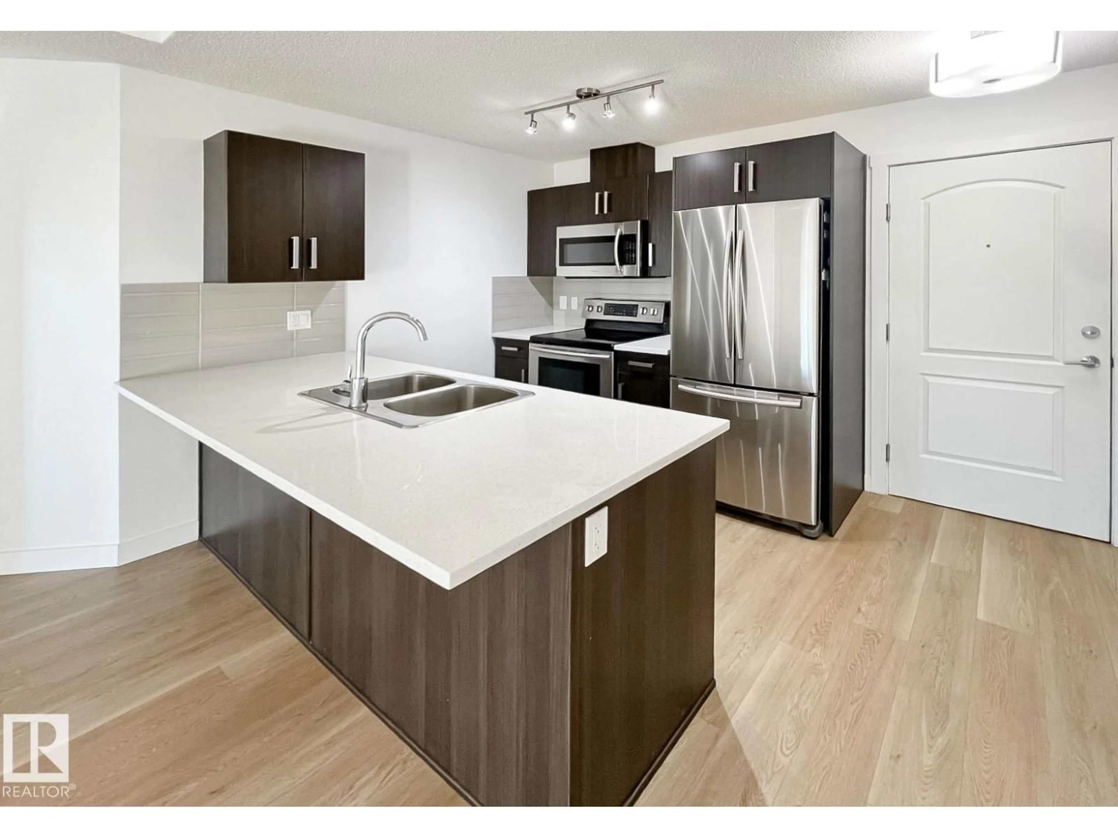 Open concept kitchen, unknown for 406 - 667 WATT BV, Edmonton Alberta T6X0Y2