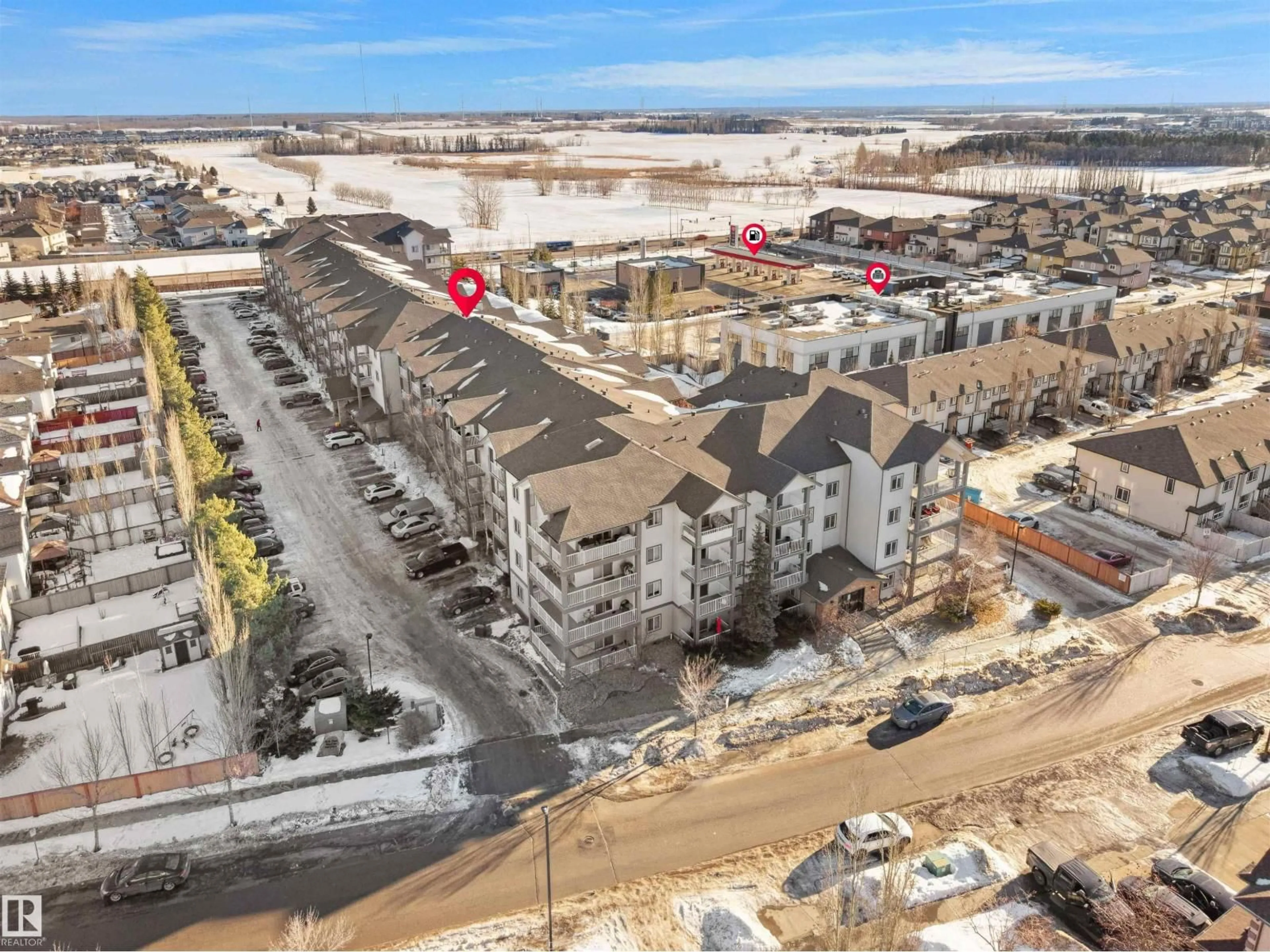 A pic from outside/outdoor area/front of a property/back of a property/a pic from drone, unknown for 318 3425 19 ST NW, Edmonton Alberta T6T2B5