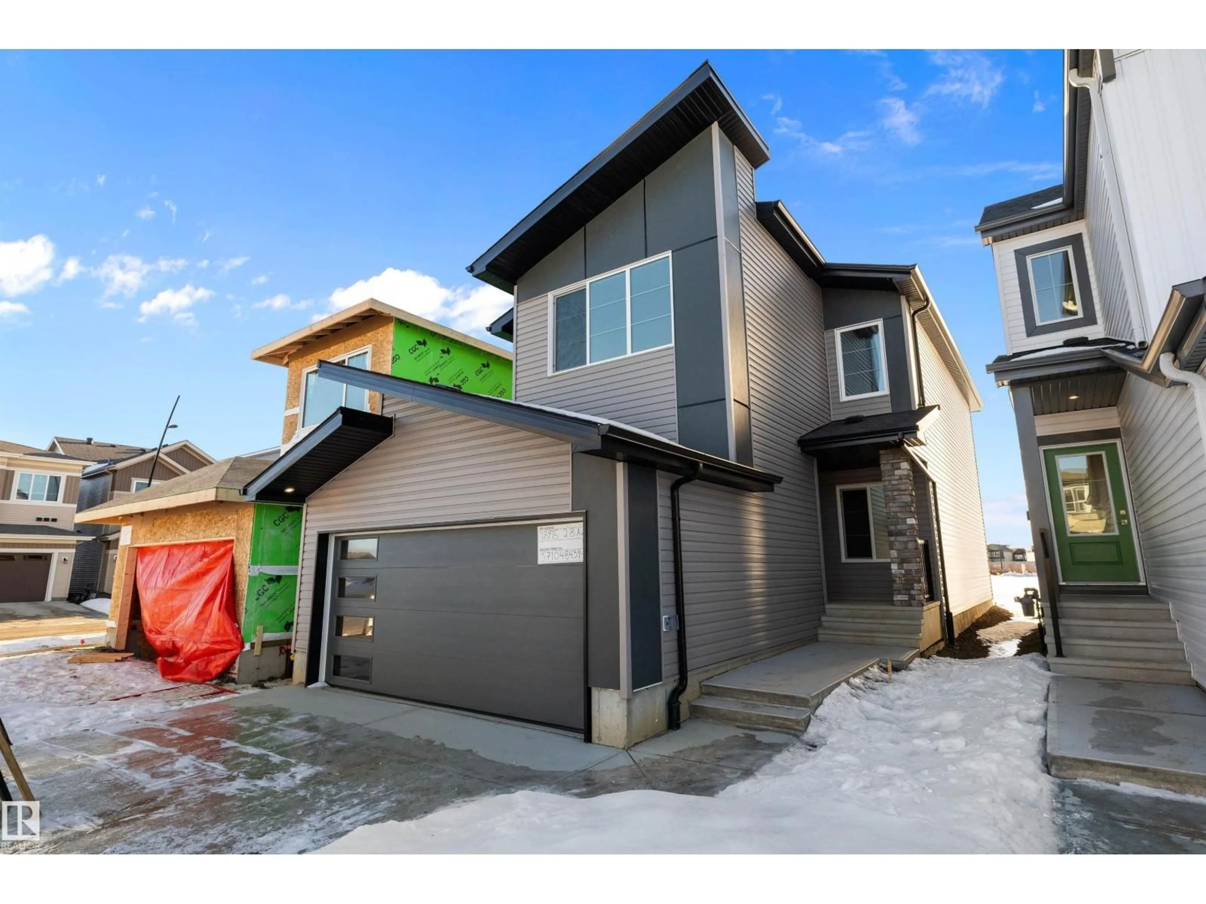 Home with brick exterior material, street for 18915 28 AV, Edmonton Alberta T6M3H9