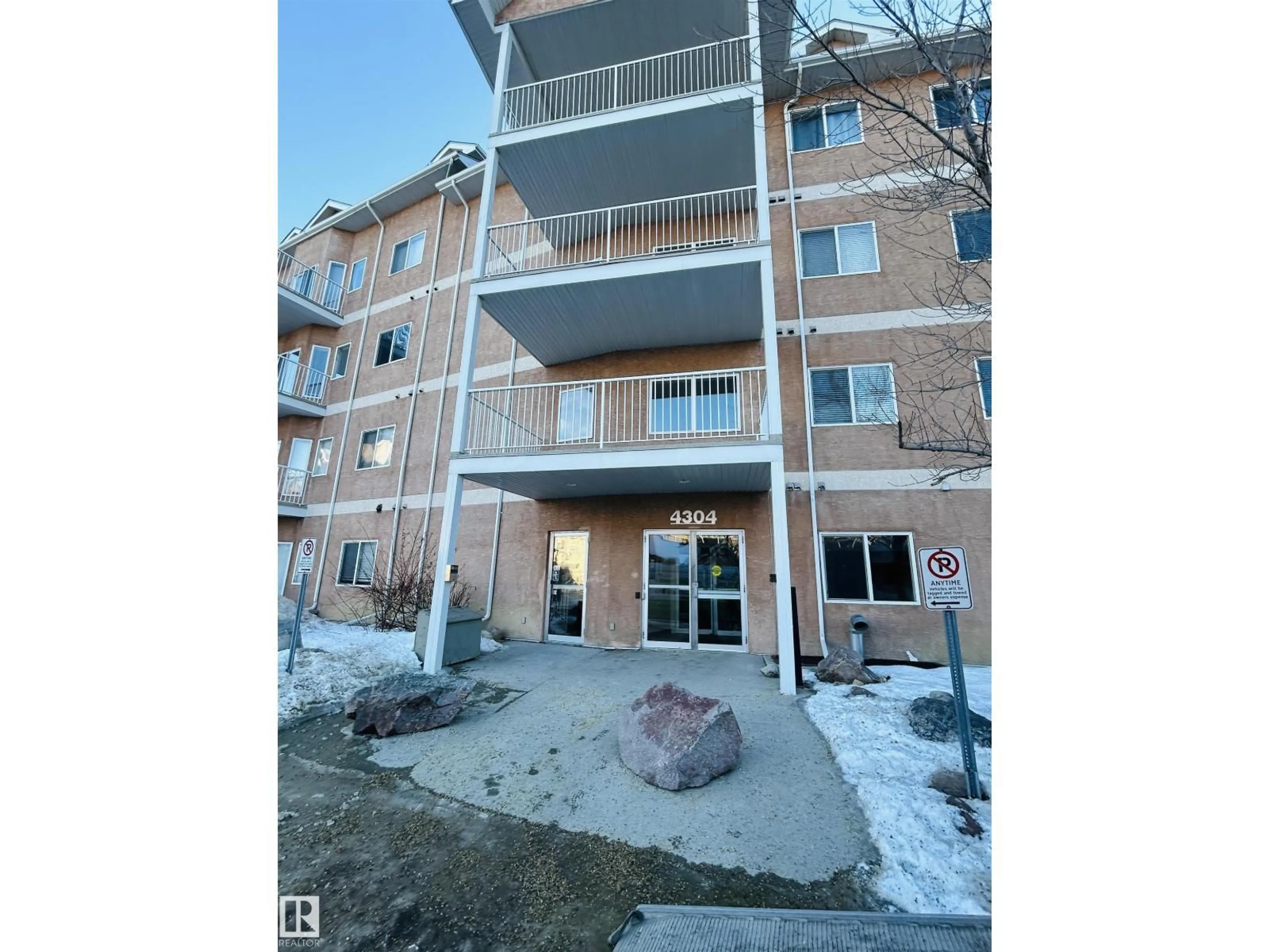 A pic from outside/outdoor area/front of a property/back of a property/a pic from drone, building for #214 - 4304 139 AV, Edmonton Alberta T5Y0H6