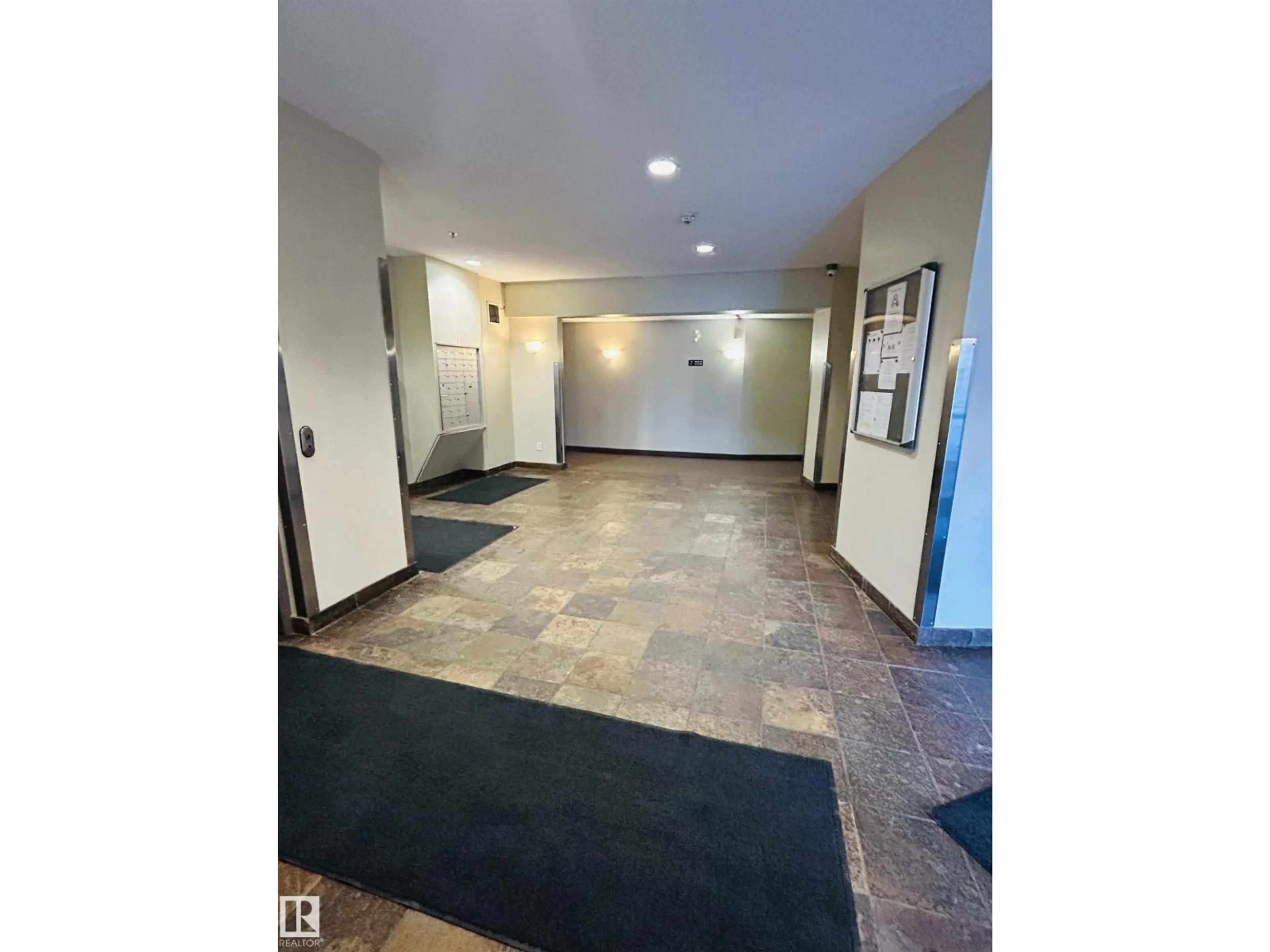 Indoor foyer for #214 - 4304 139 AV, Edmonton Alberta T5Y0H6