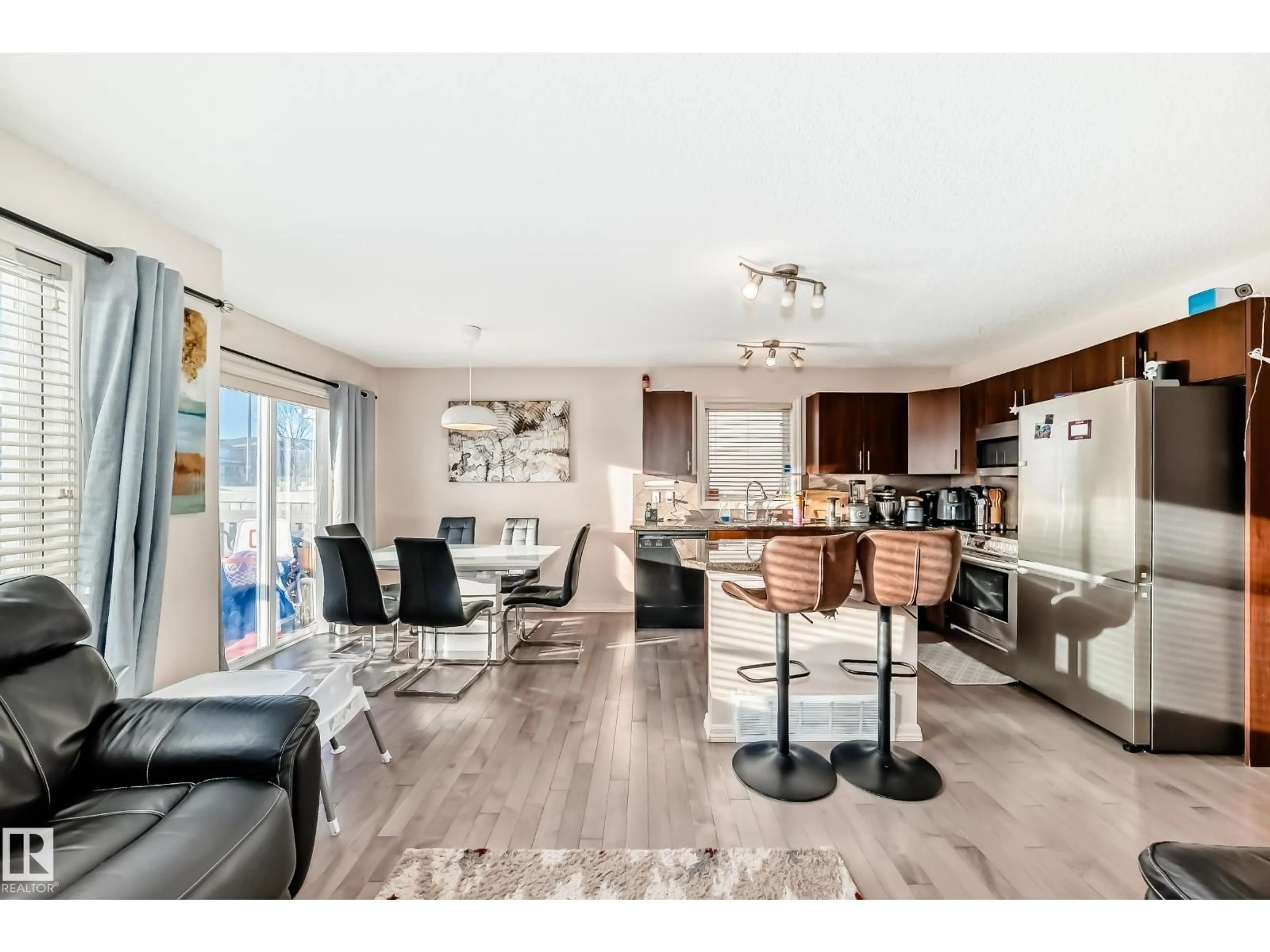 Open concept kitchen, wood/laminate floor for 1285 CUNNINGHAM DR, Edmonton Alberta T6W0R7