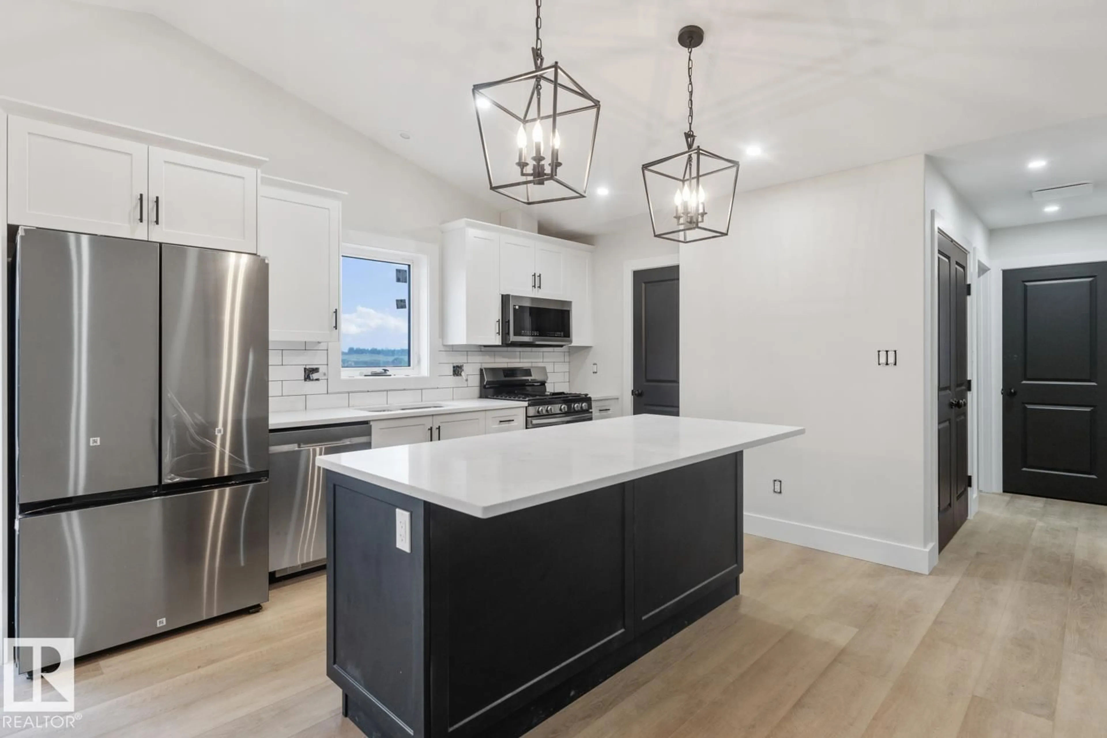 Open concept kitchen, unknown for 305 FUNDY WY, Cold Lake Alberta T9M0M4