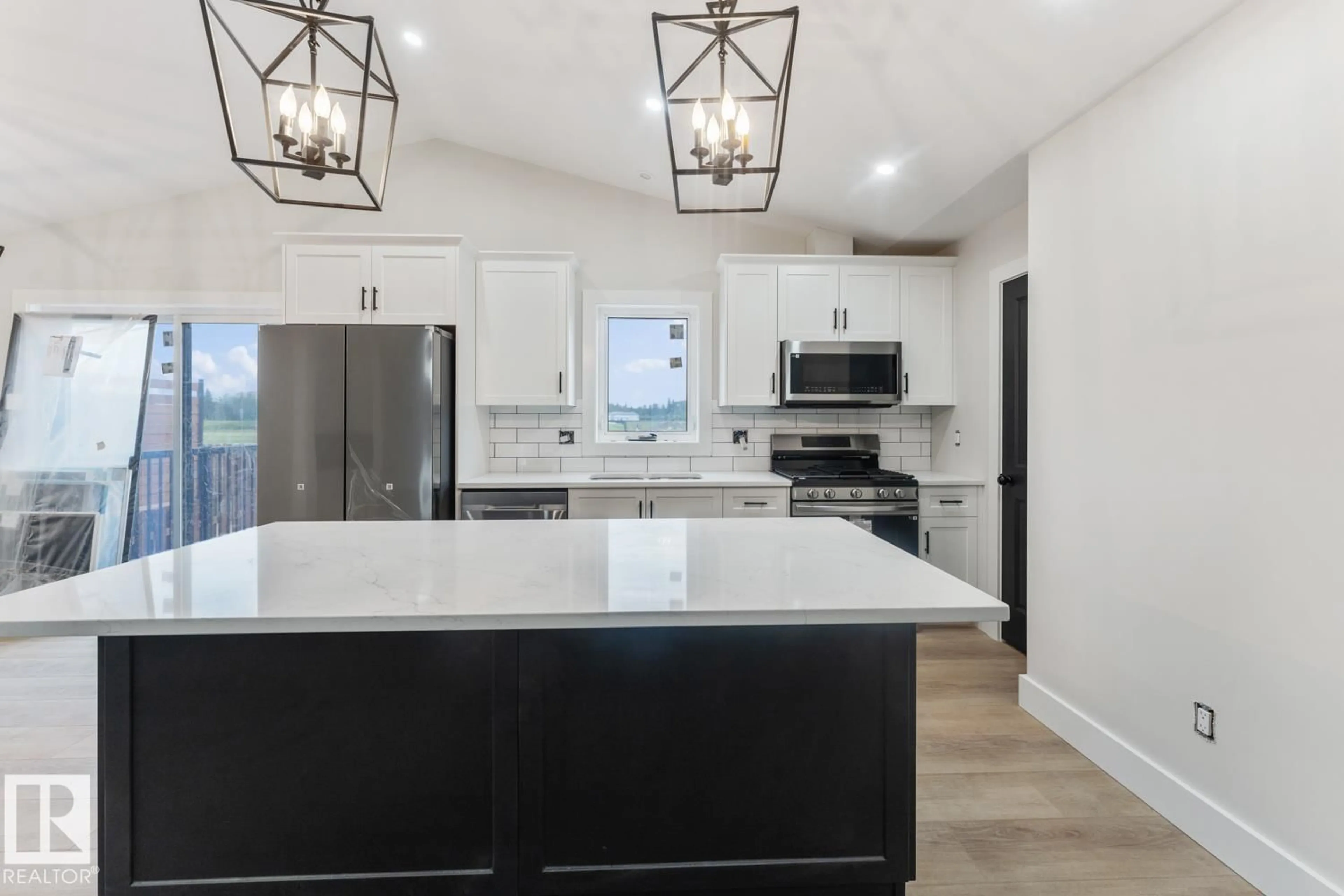 Open concept kitchen, ceramic/tile floor for 305 FUNDY WY, Cold Lake Alberta T9M0M4