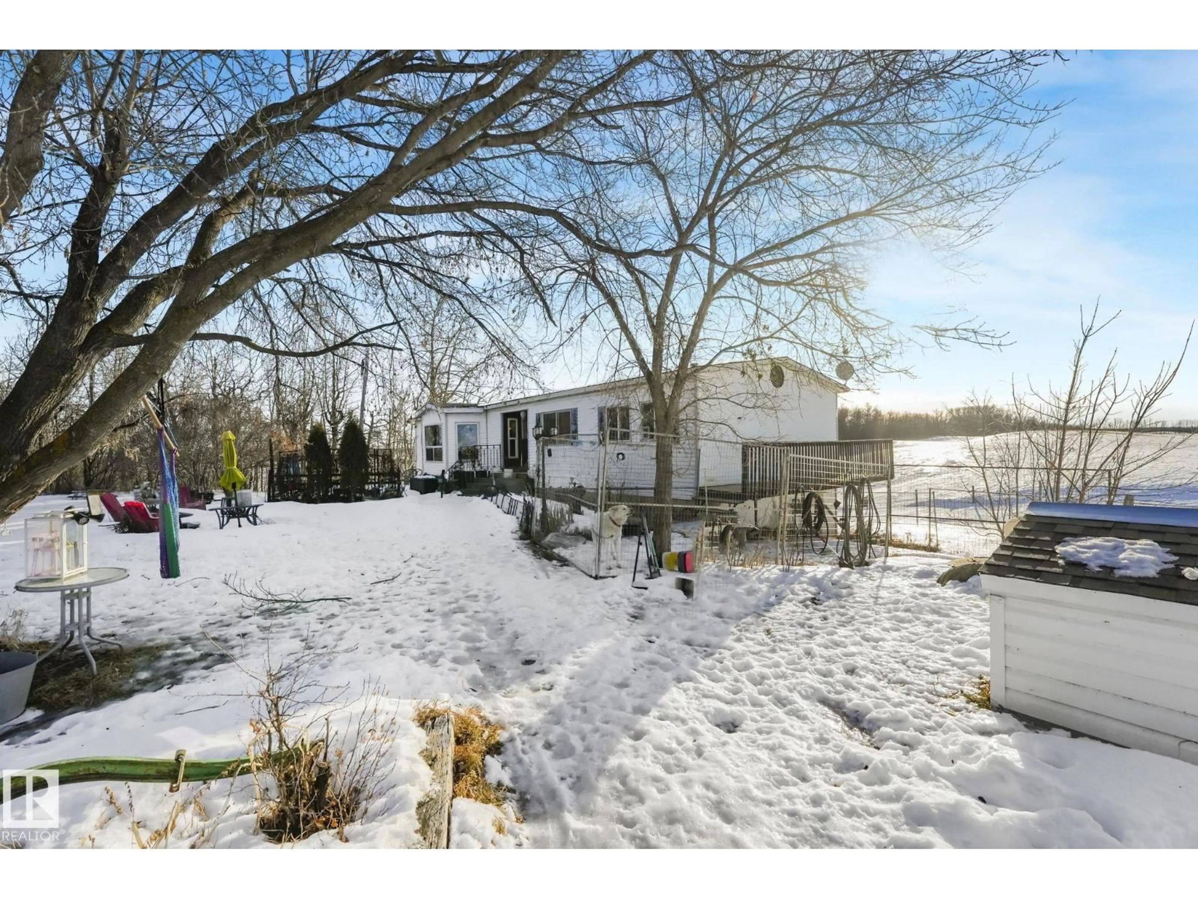 A pic from outside/outdoor area/front of a property/back of a property/a pic from drone, unknown for 22545 TWP ROAD 512, Rural Strathcona County Alberta T8C1H3